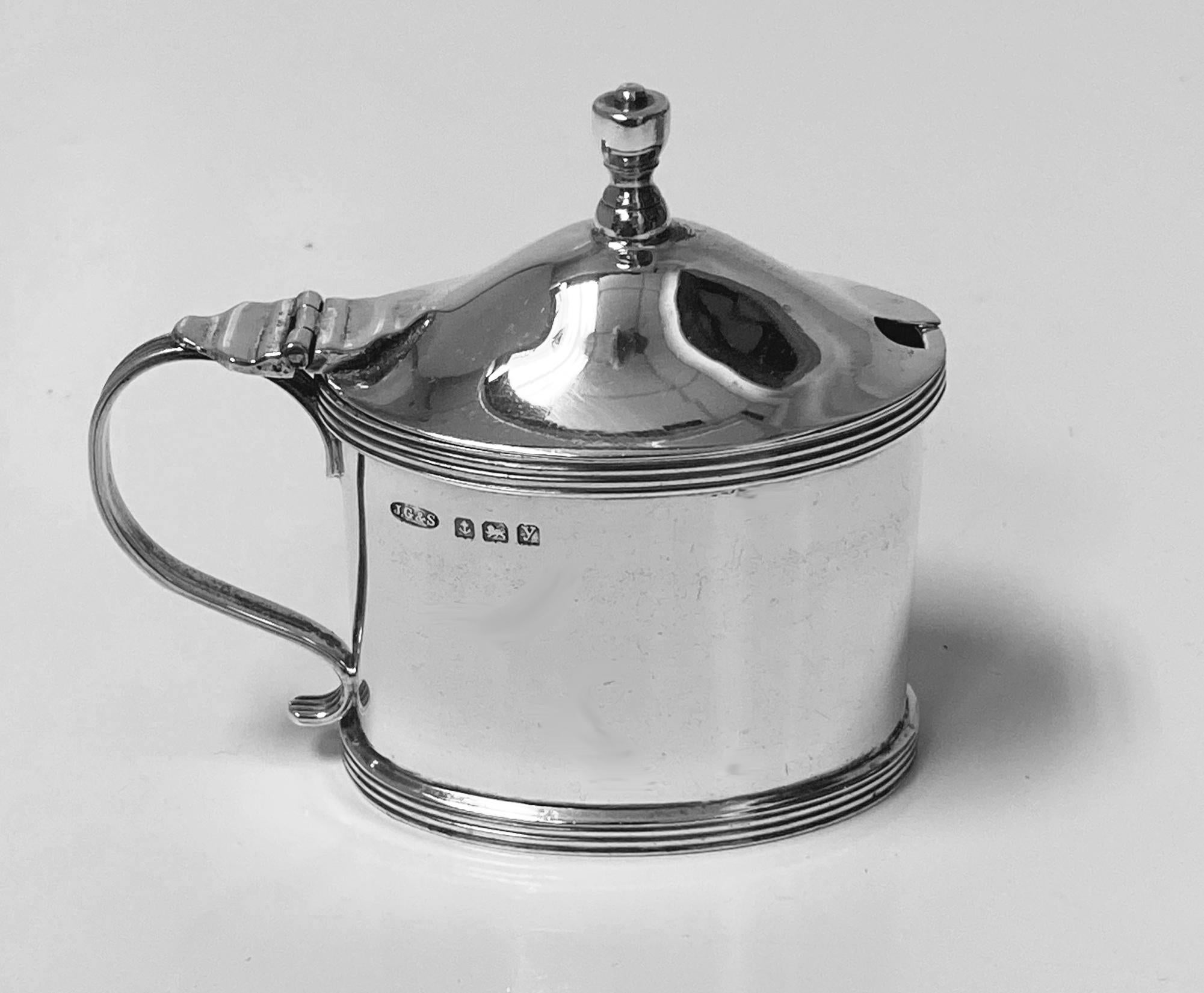 Antique English Silver Mustard Pot Birmingham 1923 John Grinsell. Plain ovoid shape, simple thread upper and lower rims, and handle. Cobalt blue glass fitted liner (small chip but perfectly useable). Measures: 3.00 x 2.50 x 1.50 inches. Silver