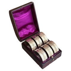 Antiguos servilleteros ingleses de plata Juego de 6 y estuche original Grabado ornamentado