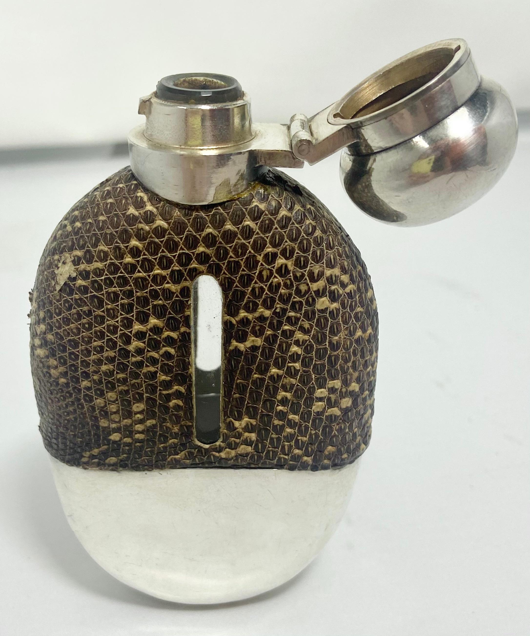 Antique English silver-plate and snakeskin hip flask, Circa 1900.