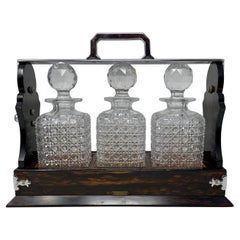 Antique English Silver Plate, Coromandel Wood and Cut Crystal 3 Bottle Tantalus.