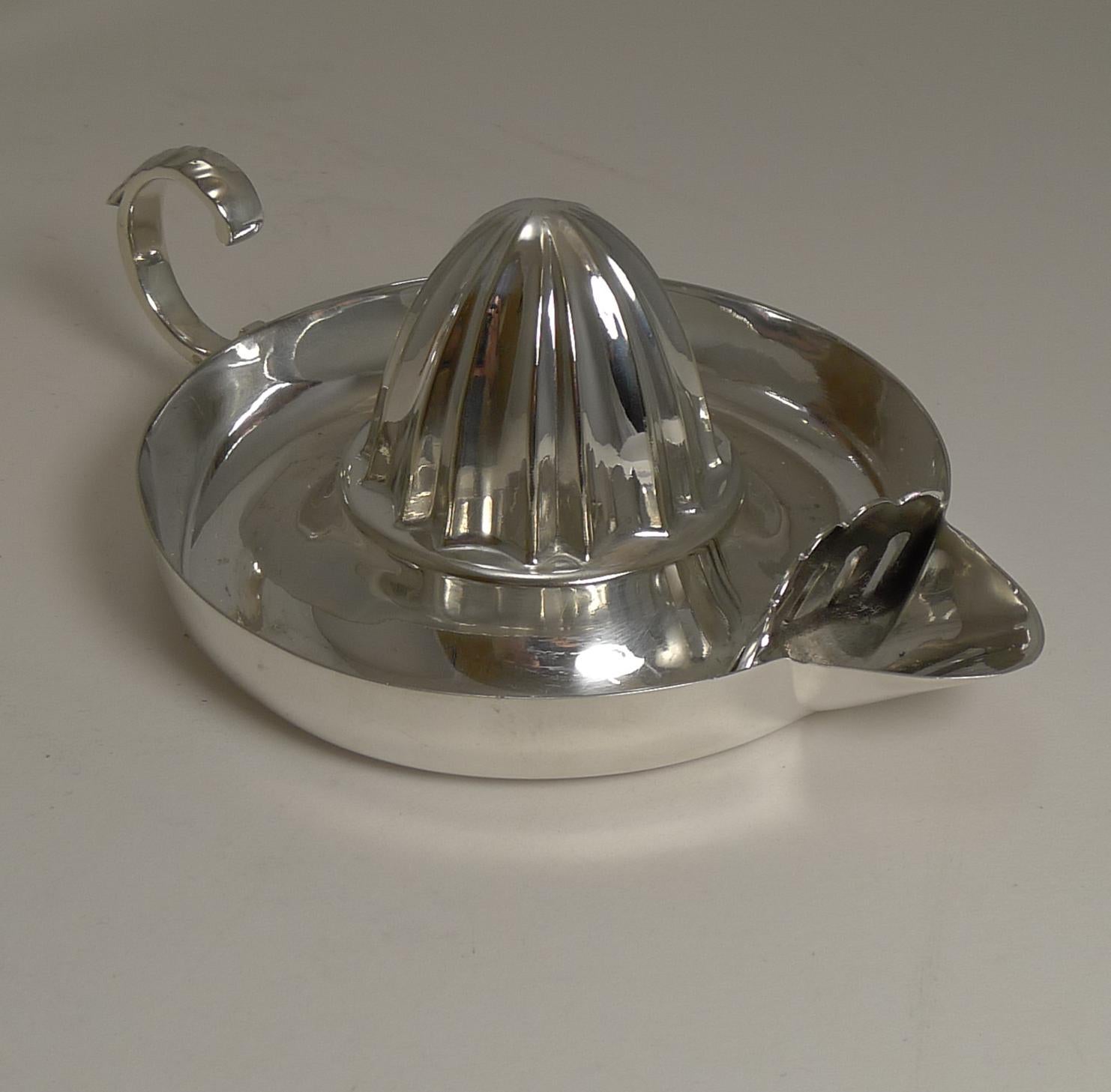 A fabulous antique lemon squeezer, perfect for the bar or cocktail cart / trolley, a great and hard to find addition to your barware collection.

Made from English silver plate marked on the underside (EPNS) for Electro_plated nickel silver, the