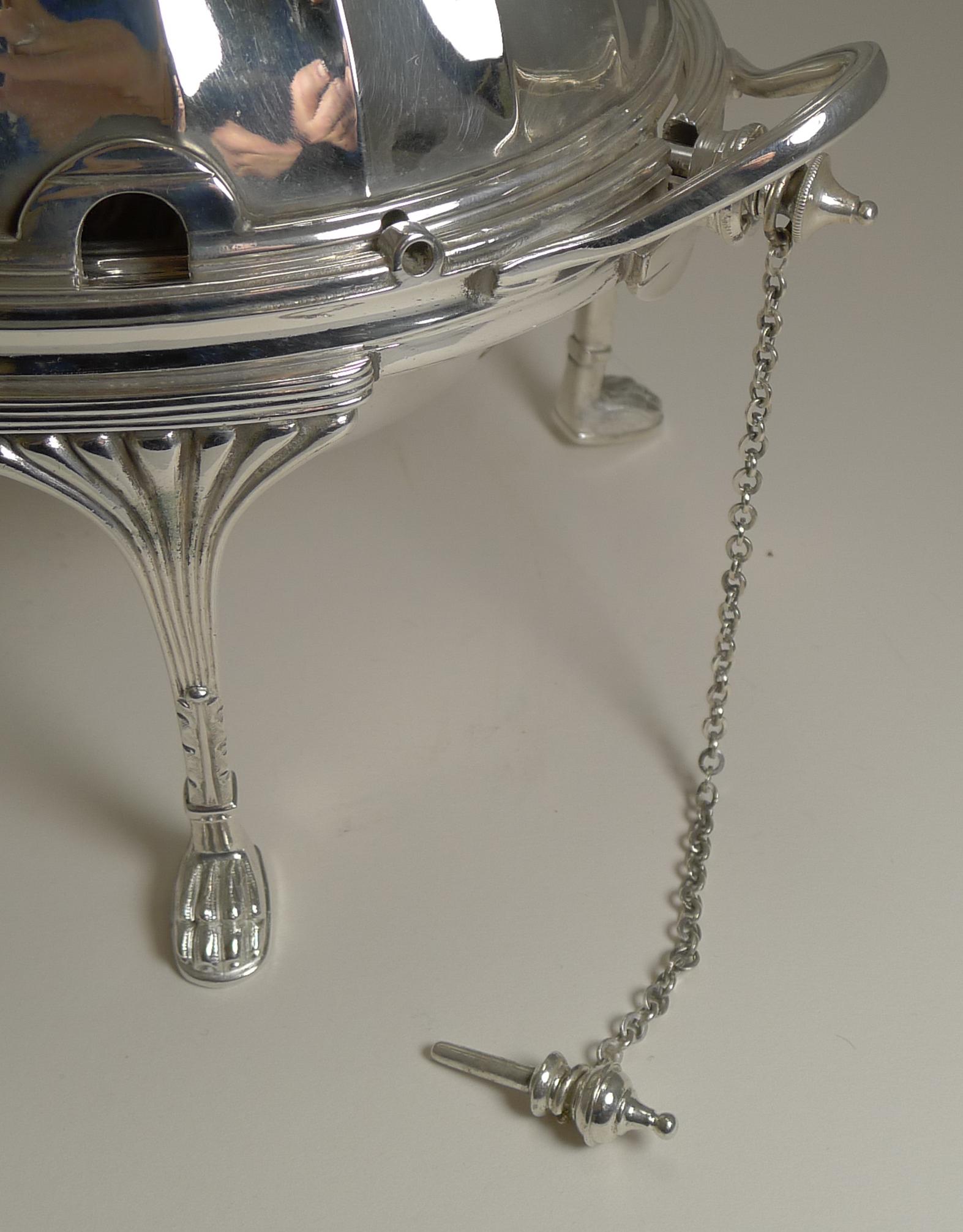 A smart and very elegant silver plated Breakfast / Chafing dish by the top-notch silversmith, Mappin and Webb of London and Sheffield; fully marked on the underside.

The dish stand on four very grand legs with paw feet and there is a key on a