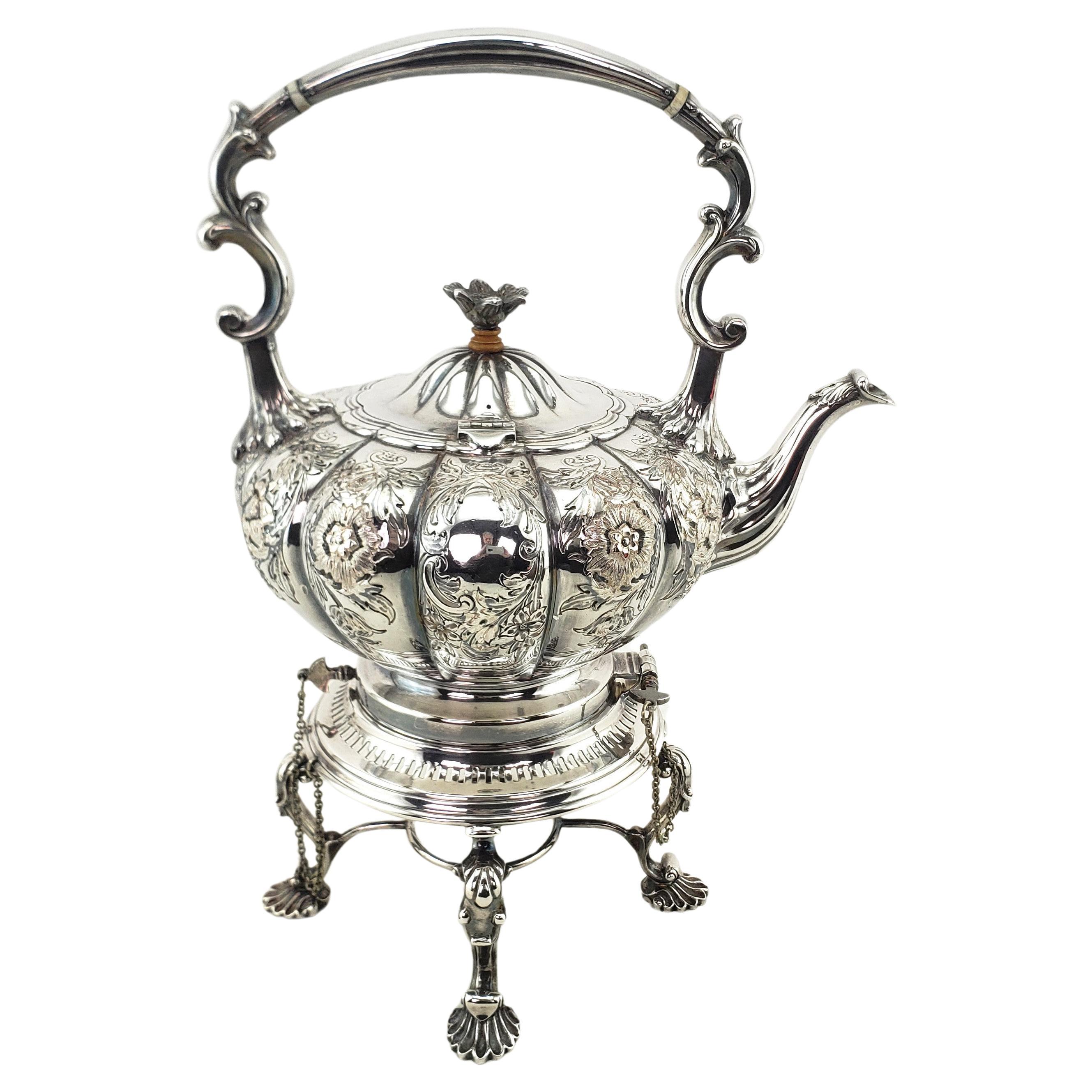 Antique English Silver Plated Tipping Hot Water Kettle with Chased Floral Motif For Sale