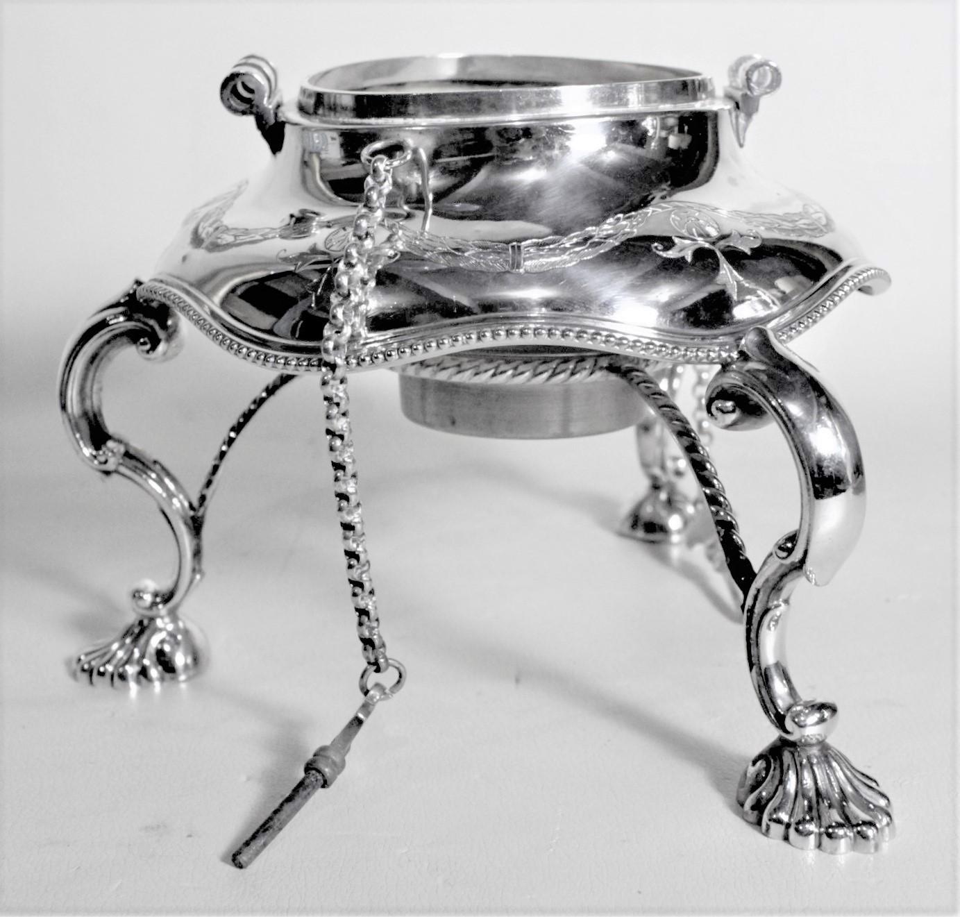 Edwardian Antique English Silver Plated Tipping Teapot or Kettle with Helmut Top and Stand For Sale