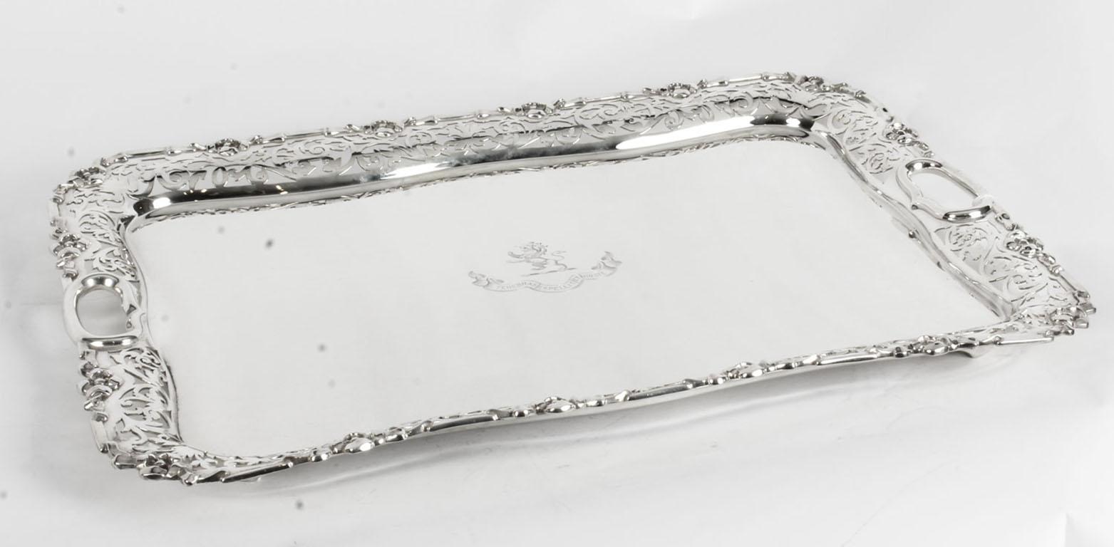 This is a wonderful antique Victorian silver plated twin handled tray, the underside bears the makers mark JR&S for James Round & Son, the renowned Sheffield silversmith, and dating from circa 1860.

This splendid large tray features beautifully