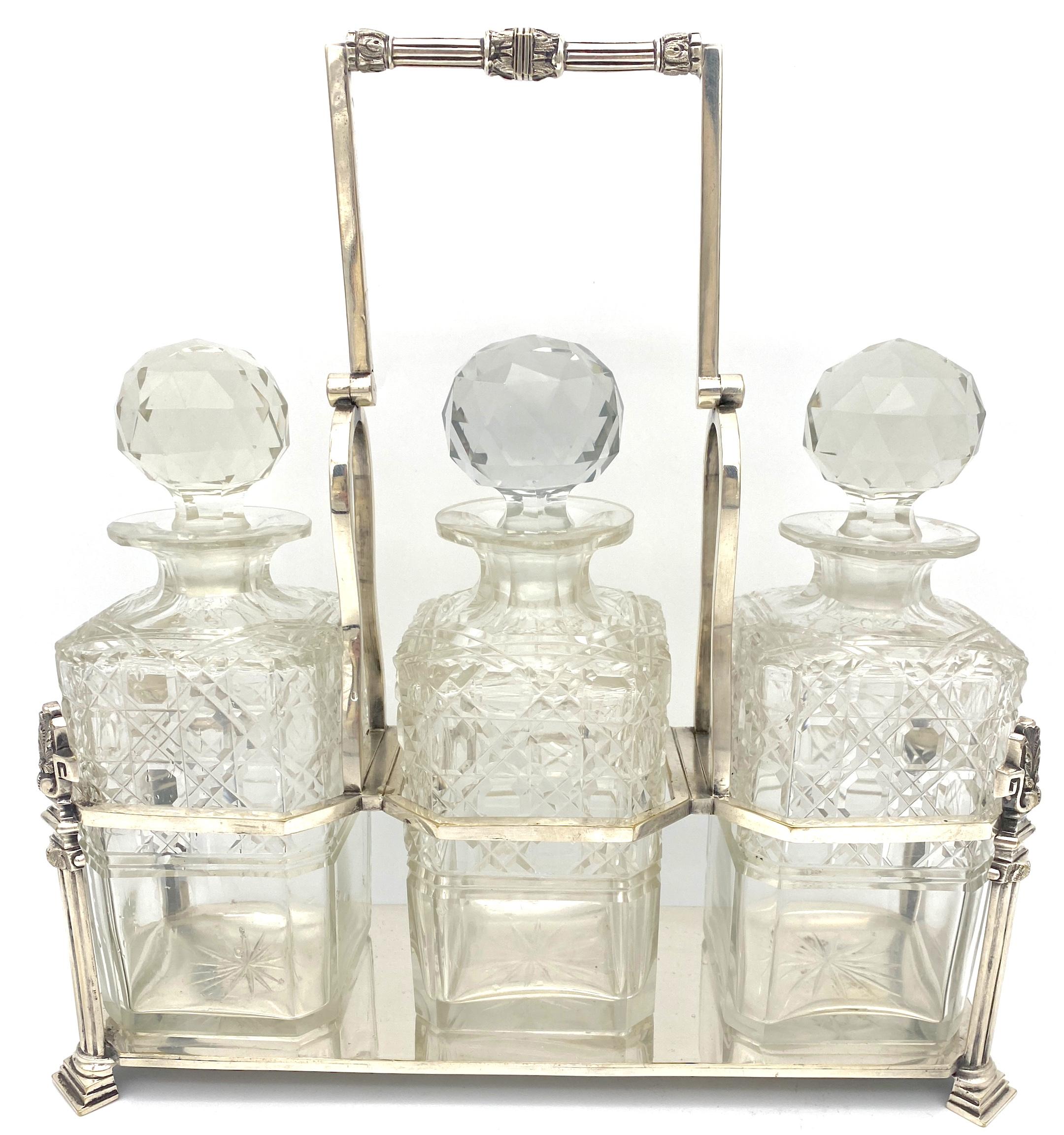 Antique English Silverplated Neoclassical Three Cut Glass Decanter/ Tauntless  
England, Circa 1890s

Presenting an exquisite Antique English Silverplated Neoclassical Three Cut Glass Decanter Decanter Set/Tauntless, originating from the 1890s in