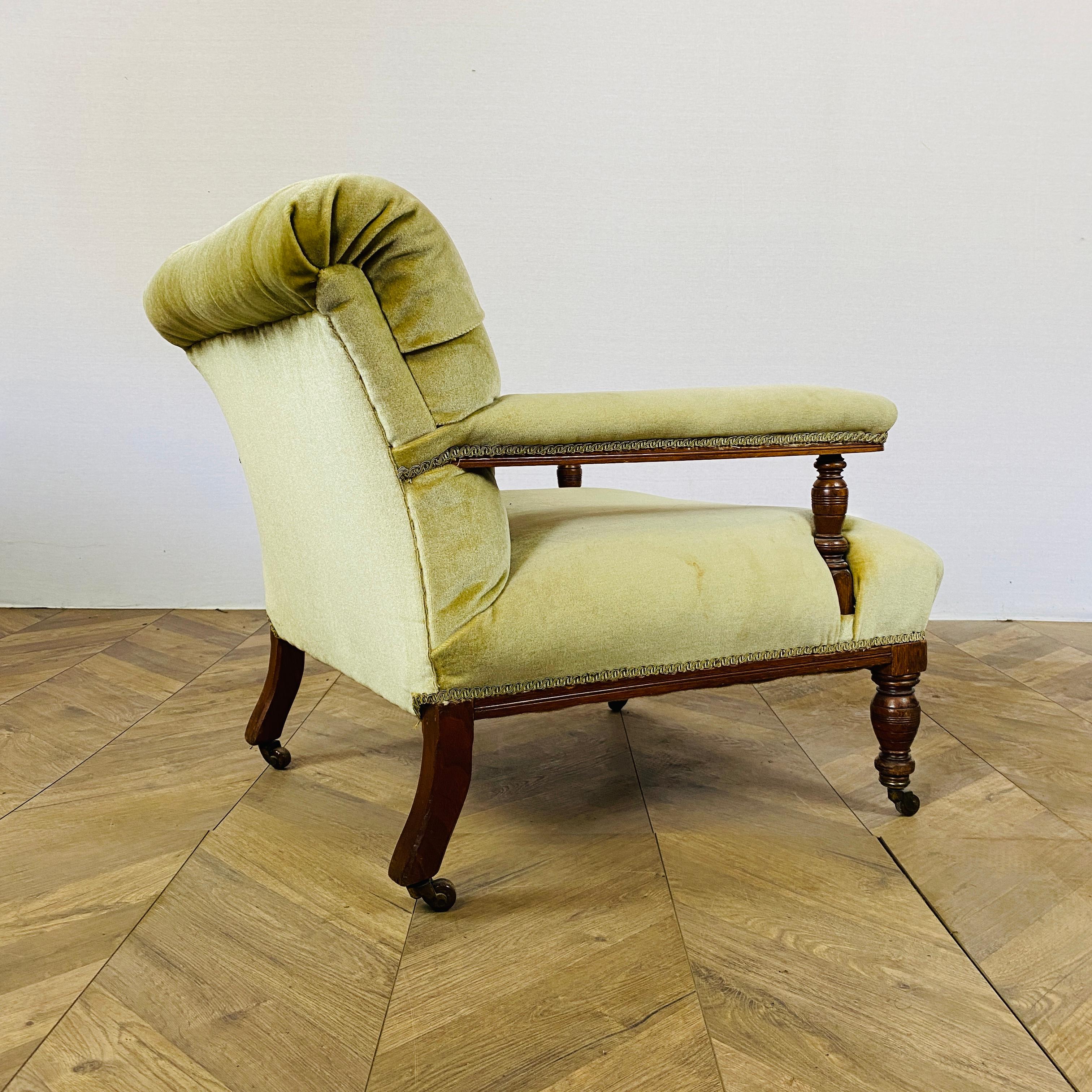 British Antique English Small Button-Back Open Armchair on Brass Castors, 1890s