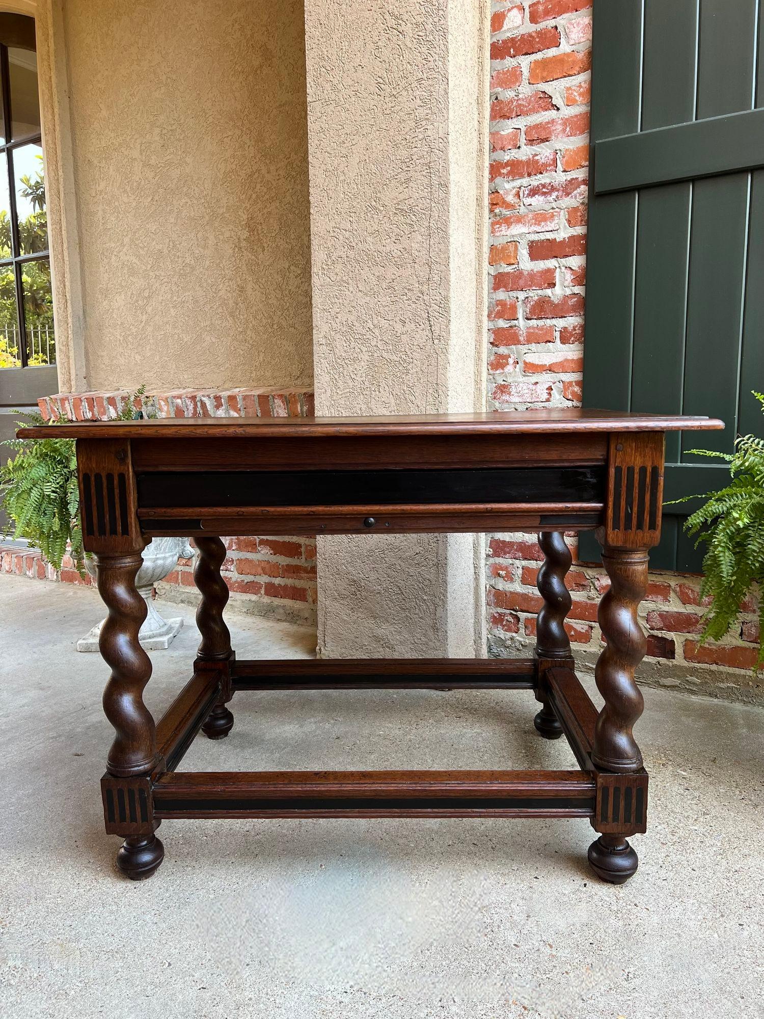 Antique English Sofa Side Table Barley Twist Ebonized Library Desk Carved Oak.

Direct from Europe, a beautiful antique English sofa table or writing desk with a gorgeous silhouette and versatile size, easily placed throughout your home to