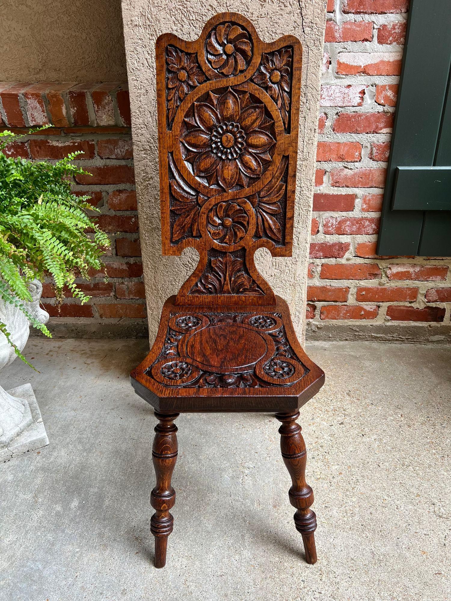 British Antique English Spinning Wheel Chair Carved Oak Hall Fireplace Hearth Chair For Sale