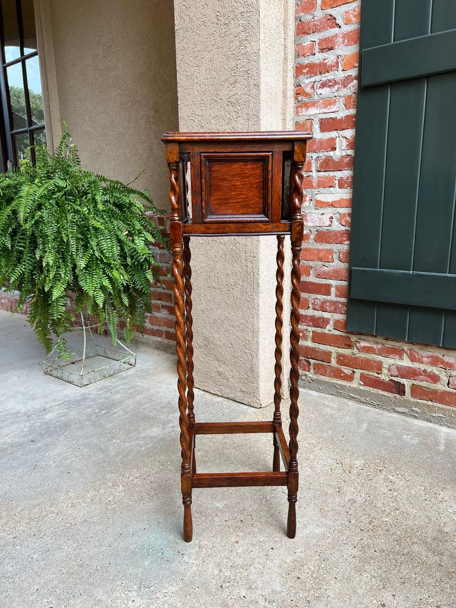 tall antique plant stand