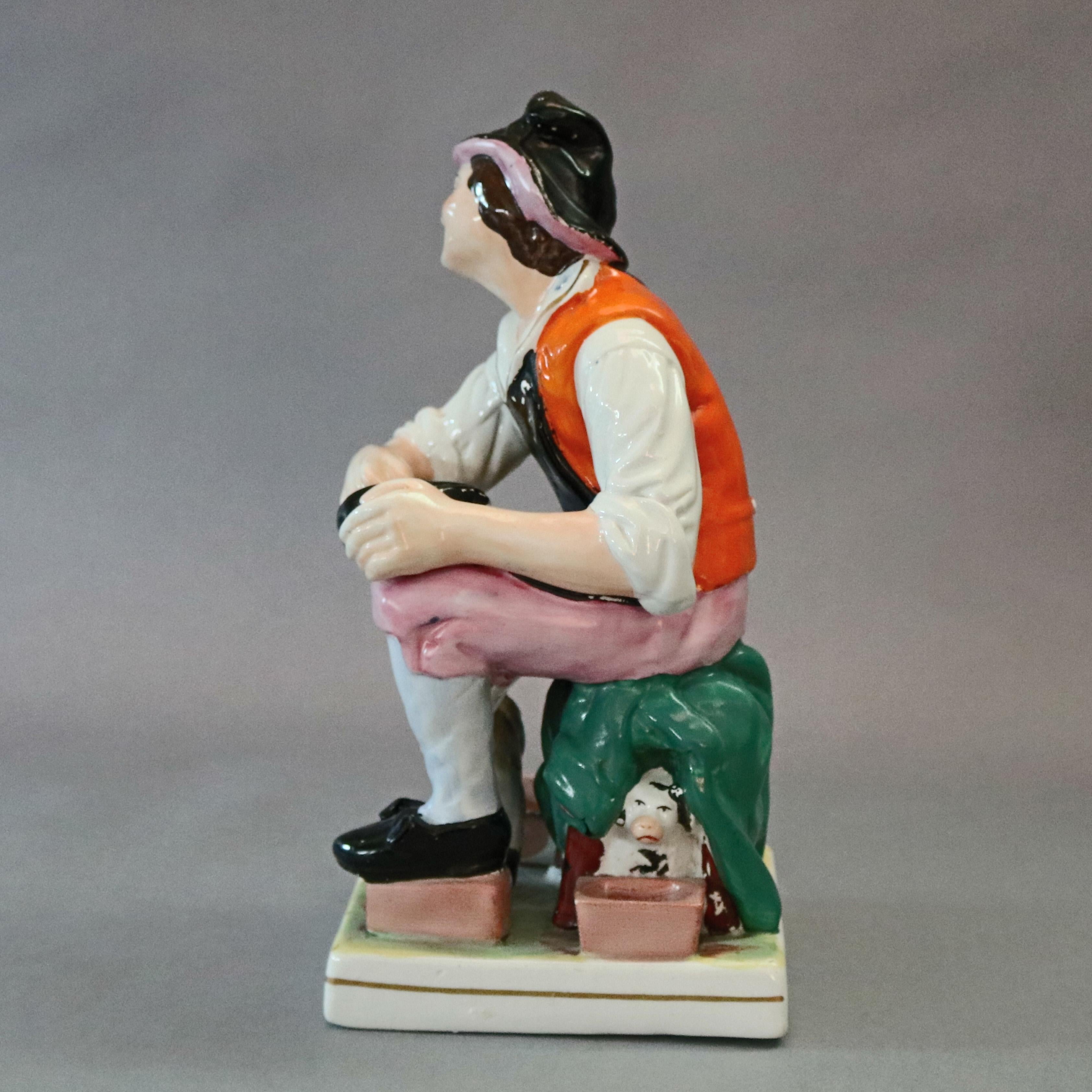 Antique English Staffordshire Hand Painted Figural Porcelain Cobbler, circa 1860 In Good Condition For Sale In Big Flats, NY