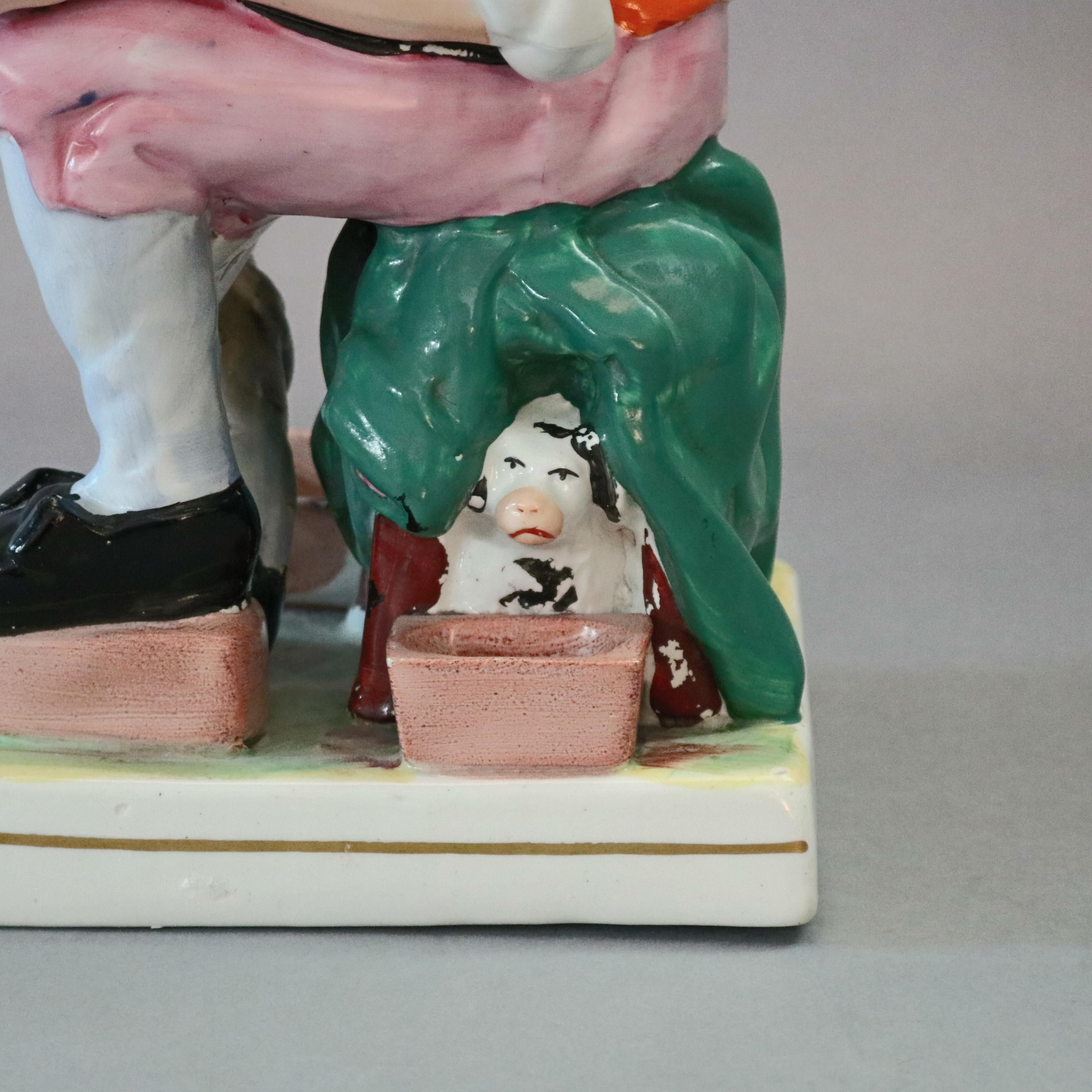 19th Century Antique English Staffordshire Hand Painted Figural Porcelain Cobbler, circa 1860 For Sale
