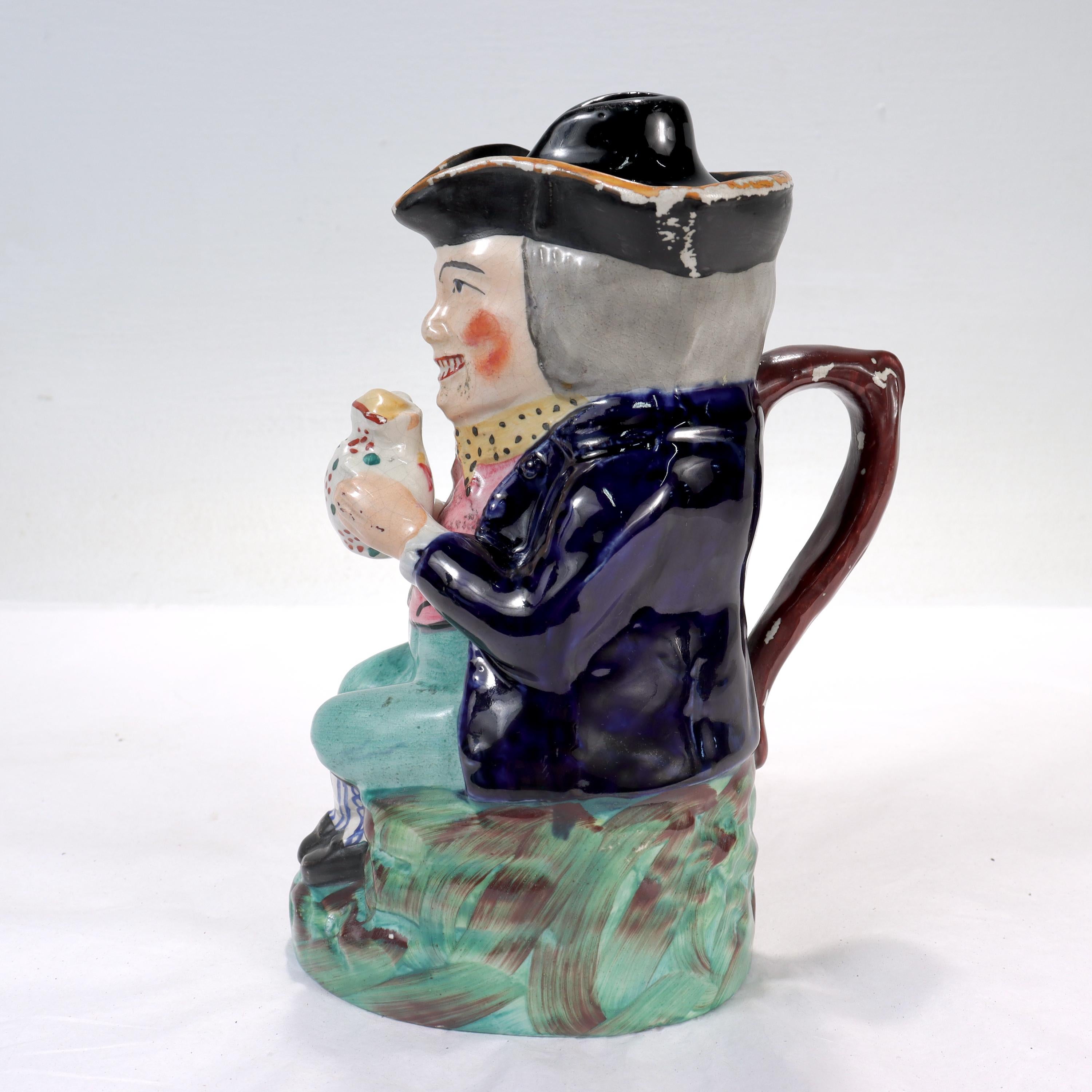 Georgian Antique English Staffordshire Pottery Toby Jug with a Tricorn Hat Lid For Sale