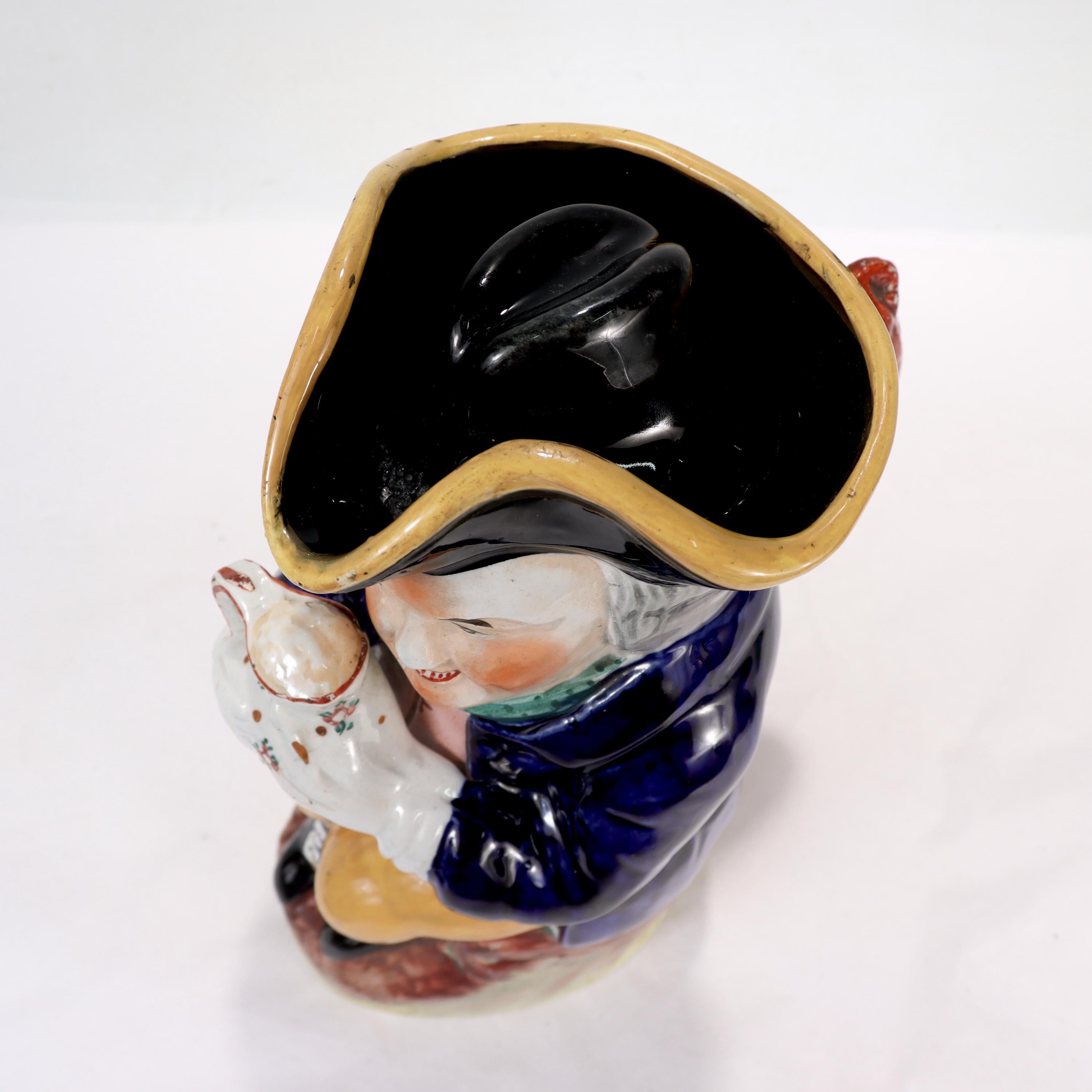 19th Century Antique English Staffordshire Pottery Toby Jug with Tricorn Hat Lid For Sale