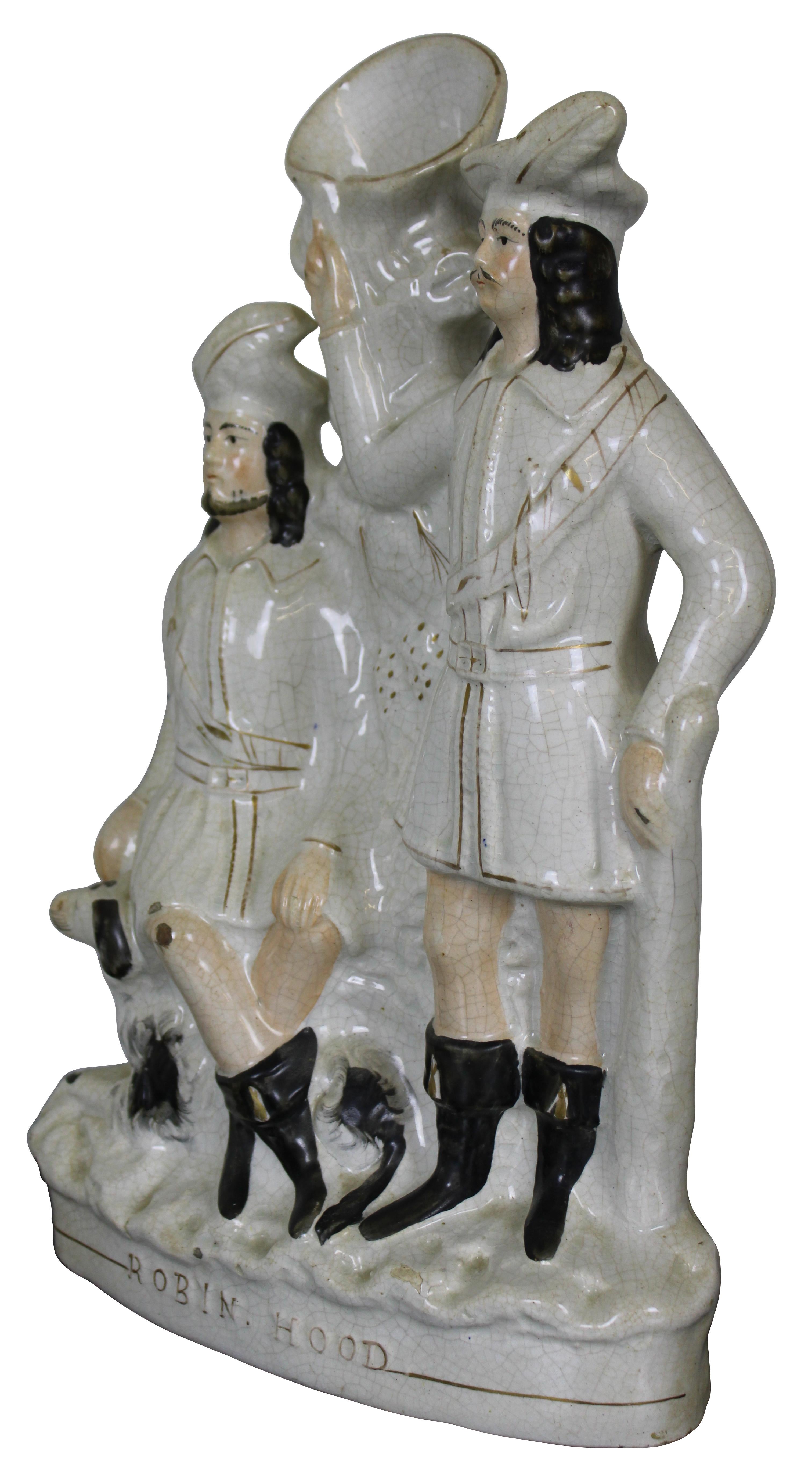 Circa mid 19th century antique Staffordshire English porcelain spill flower vase sculpture showing the folk heroes Robin Hood and Little John with a dog. Measure: 15”.
 