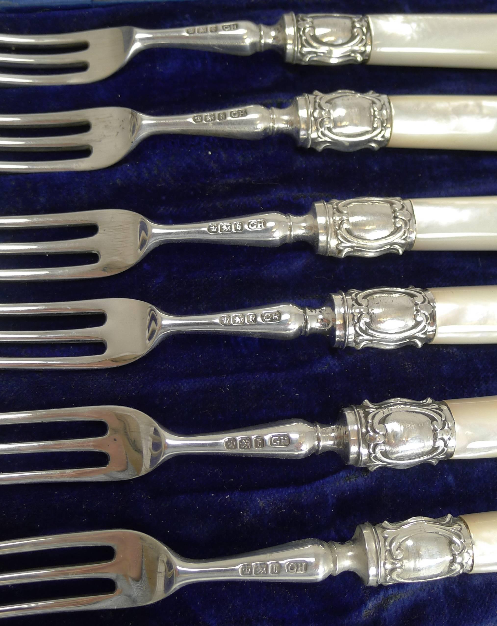 A wonderful set of six desert, fruit or cake forks sitting in a presentation box, these would make a wonderful gift.

The forks are made from sterling silver, made by the silversmith George Howson, and each hallmarked for Sheffield 1900, late