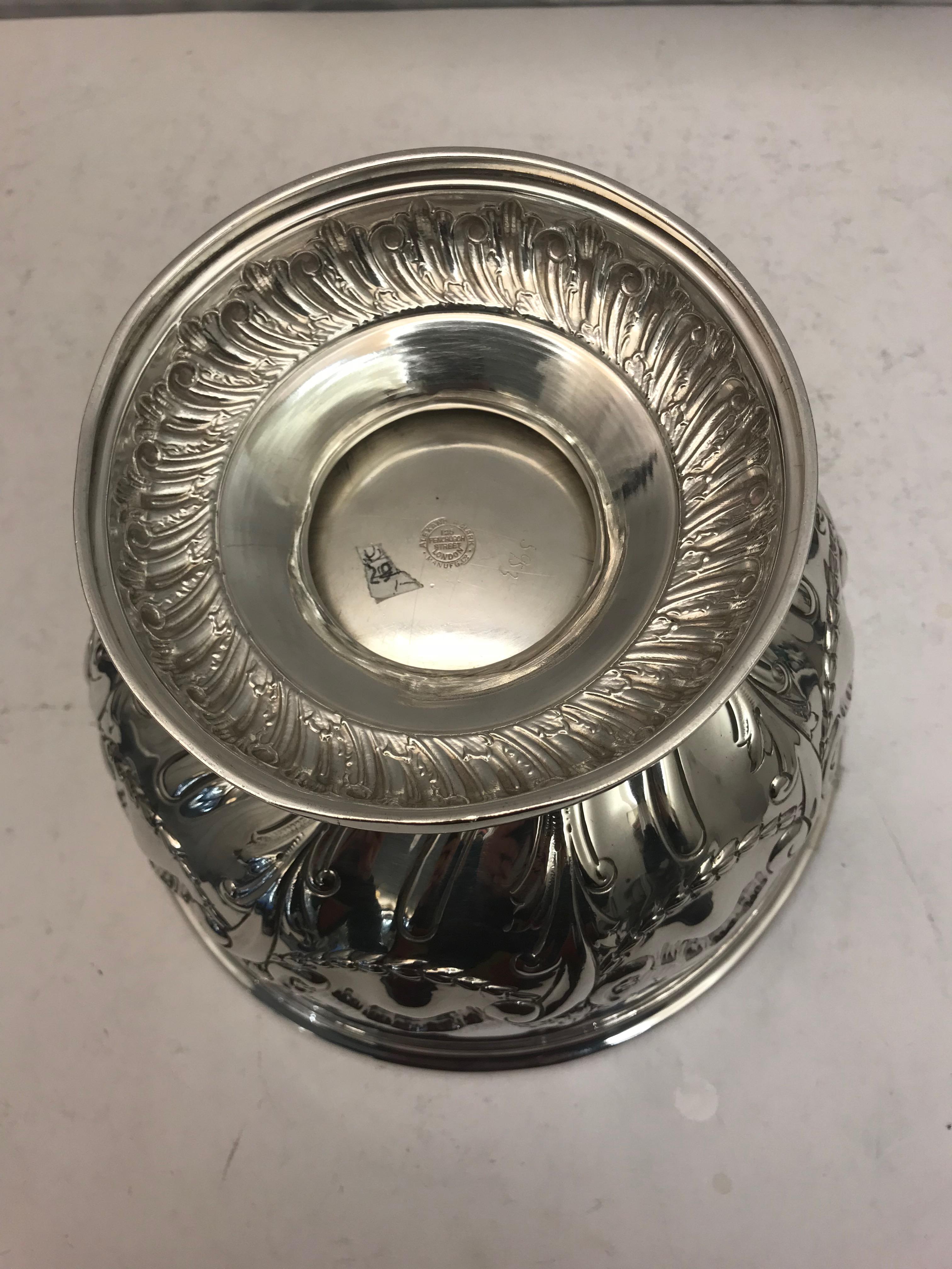 A decorative antique sterling silver bowl made in Birmingham in 1907.
 