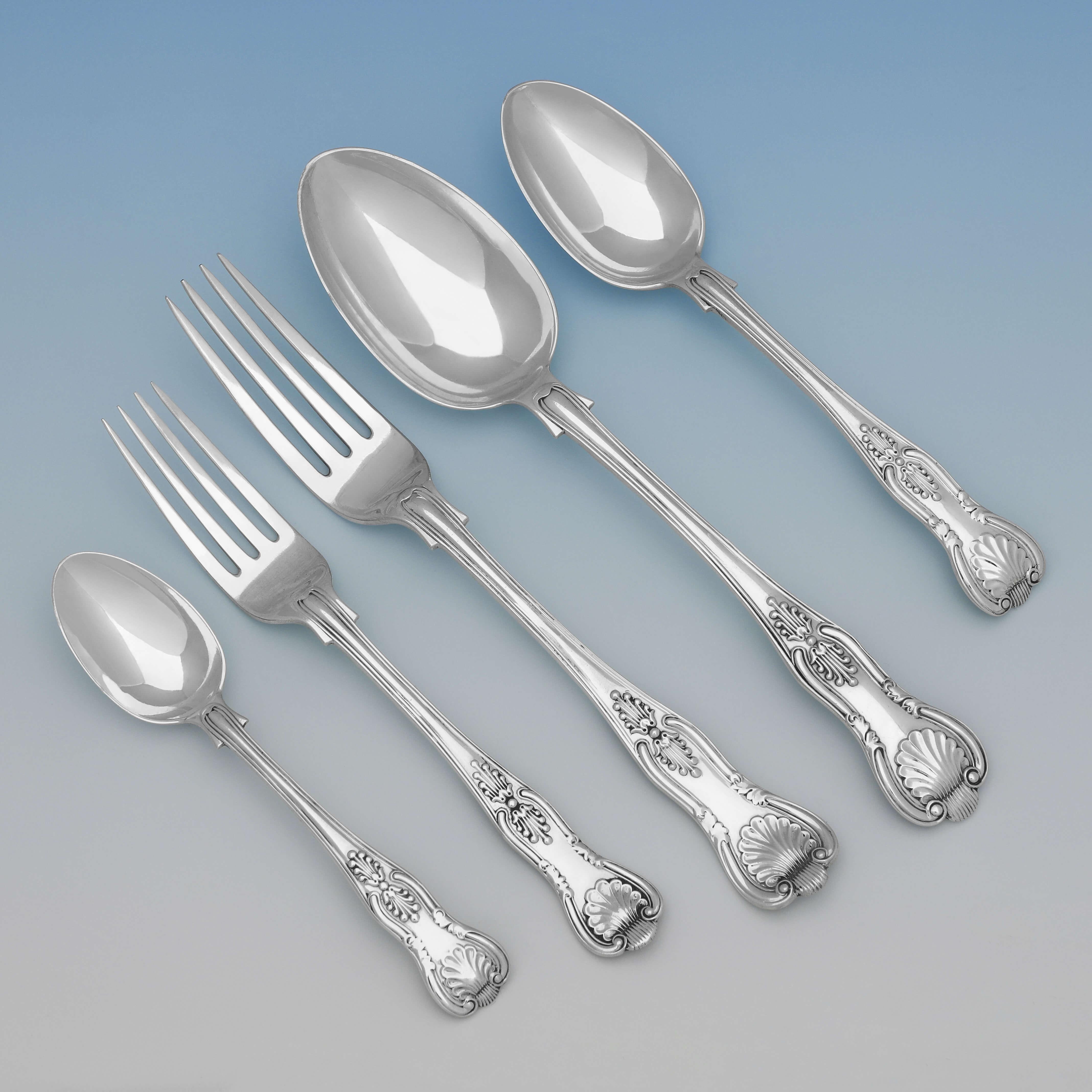 A Single Maker, Mixed Years set of Antique, Sterling Silver Kings Pattern Flatware, hallmarked in London between 1900 and 1907 by Jackson & Fullerton.

Sold with modern Kings pattern sterling silver knives as pictured. 
Each place setting