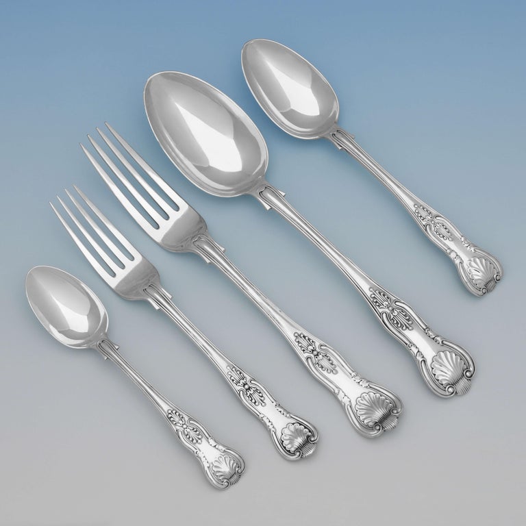 A Single Maker, Mixed Years set of Antique, Sterling Silver Kings Pattern Flatware, hallmarked in London between 1900 and 1907 by Jackson & Fullerton.

Sold with modern Kings pattern sterling silver knives as pictured. 
Each place setting