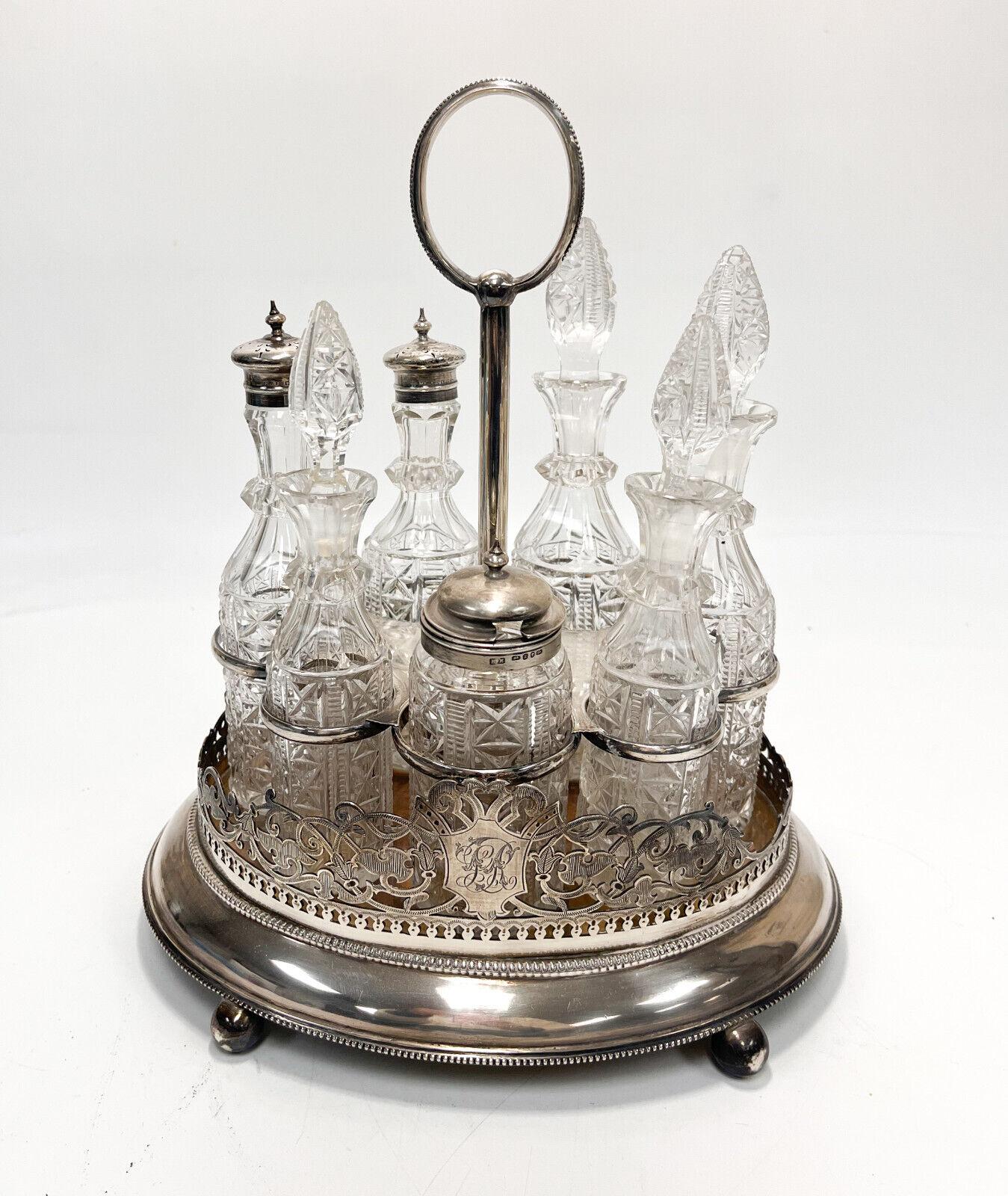 Antique English sterling silver cruet set, 19th Century. Cut glass diamonds to the glasses. John Eldershaw Brunt and Henry Manton sterling silver maker marks.
 
Additional Information: 
Type: Cruet Set
Materials: Sterling Silver and Glass
Weight