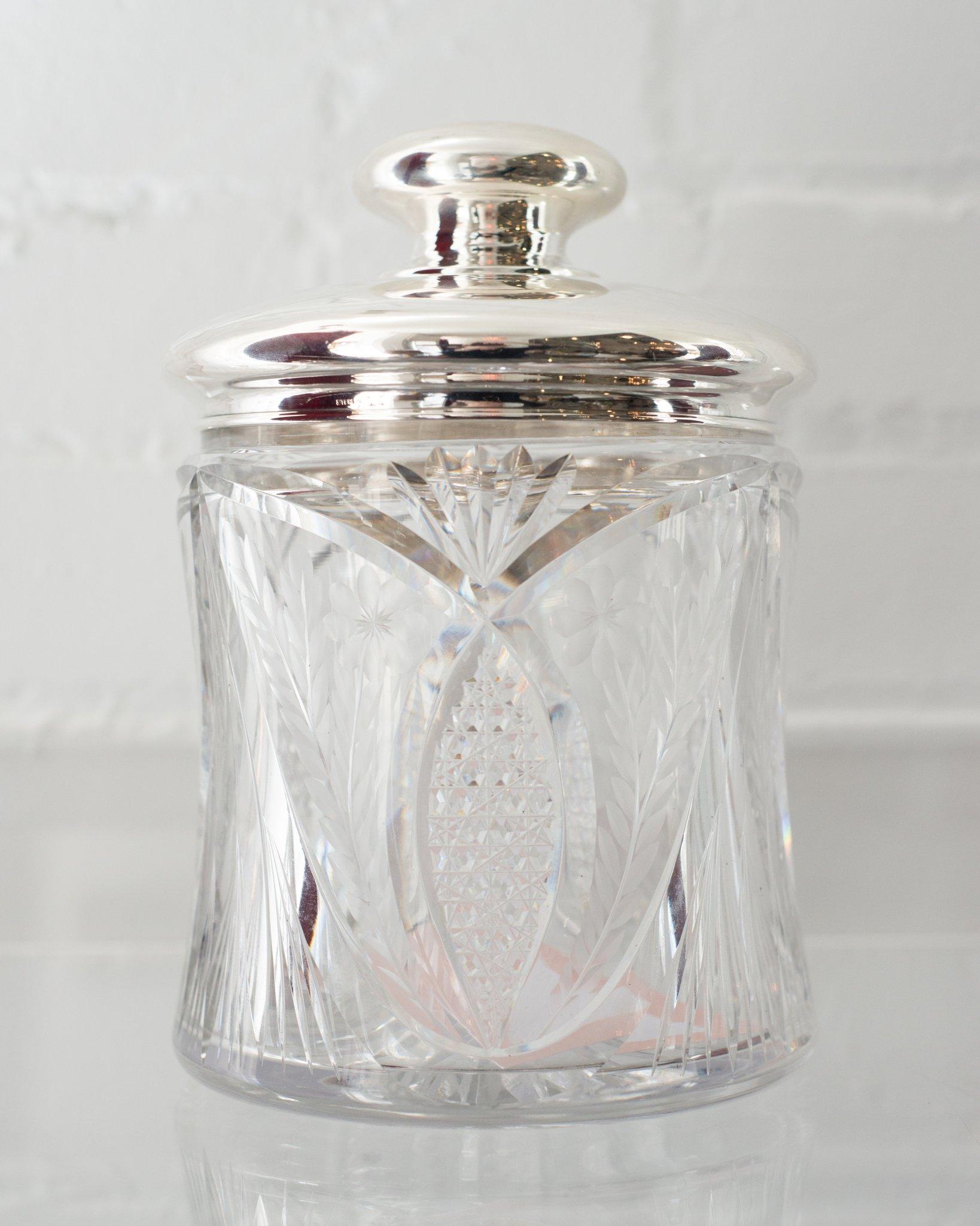 This stunning antique cut crystal jar with a sterling silver lid is an elegant vessel to hold your favourite treats. Our clients are always asking how they can incorporate antiques into their home. We always encourage them to utilize Antiques in