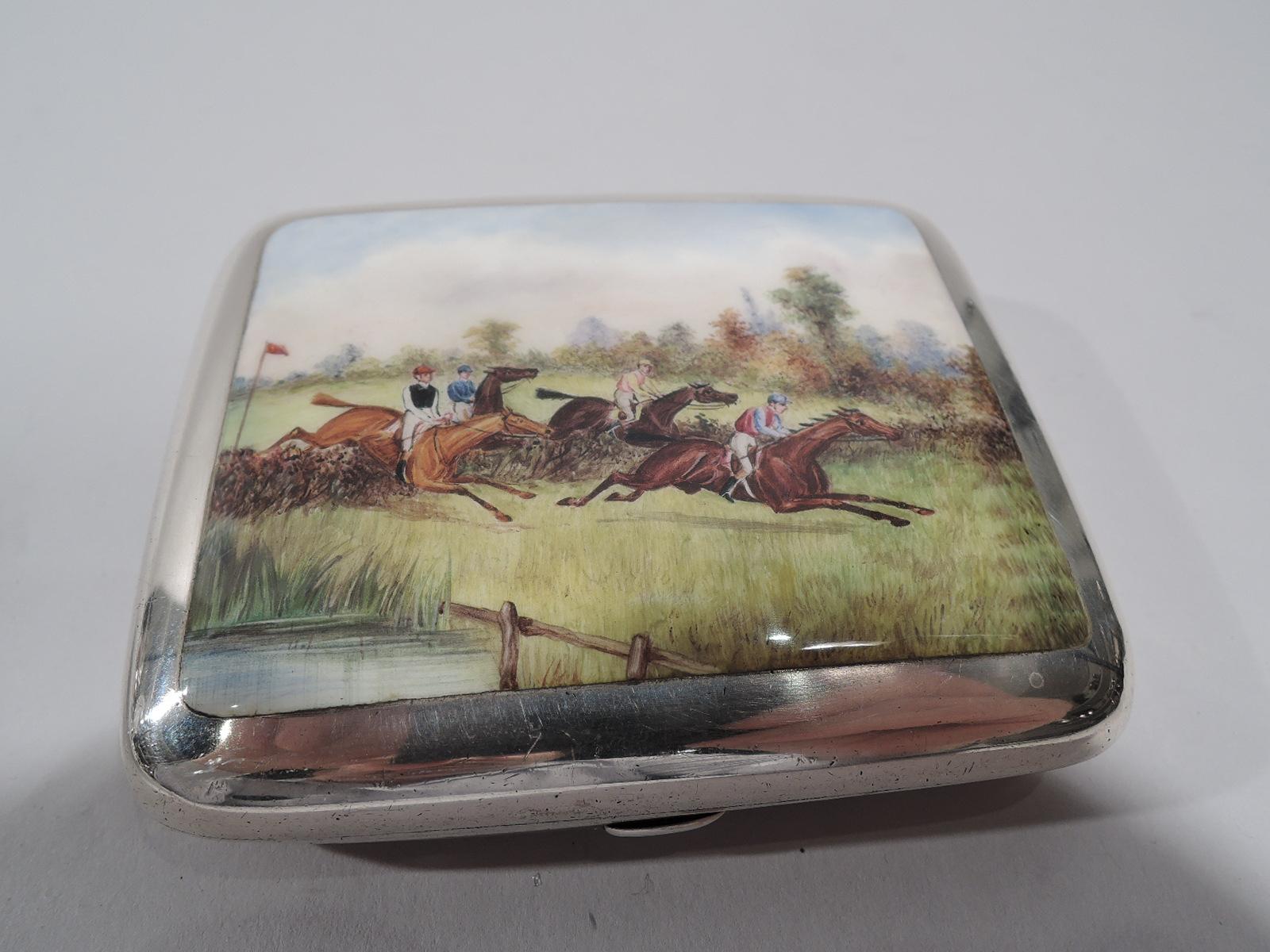 Victorian sterling silver and enamel cigarette case. Made by Howard James in Birmingham in 1888. Rectangular and hinged. On cover is enameled a steeplechase race with four horses taking a hedge, next to a fenced pond. Interior gilt. Fully marked.  
