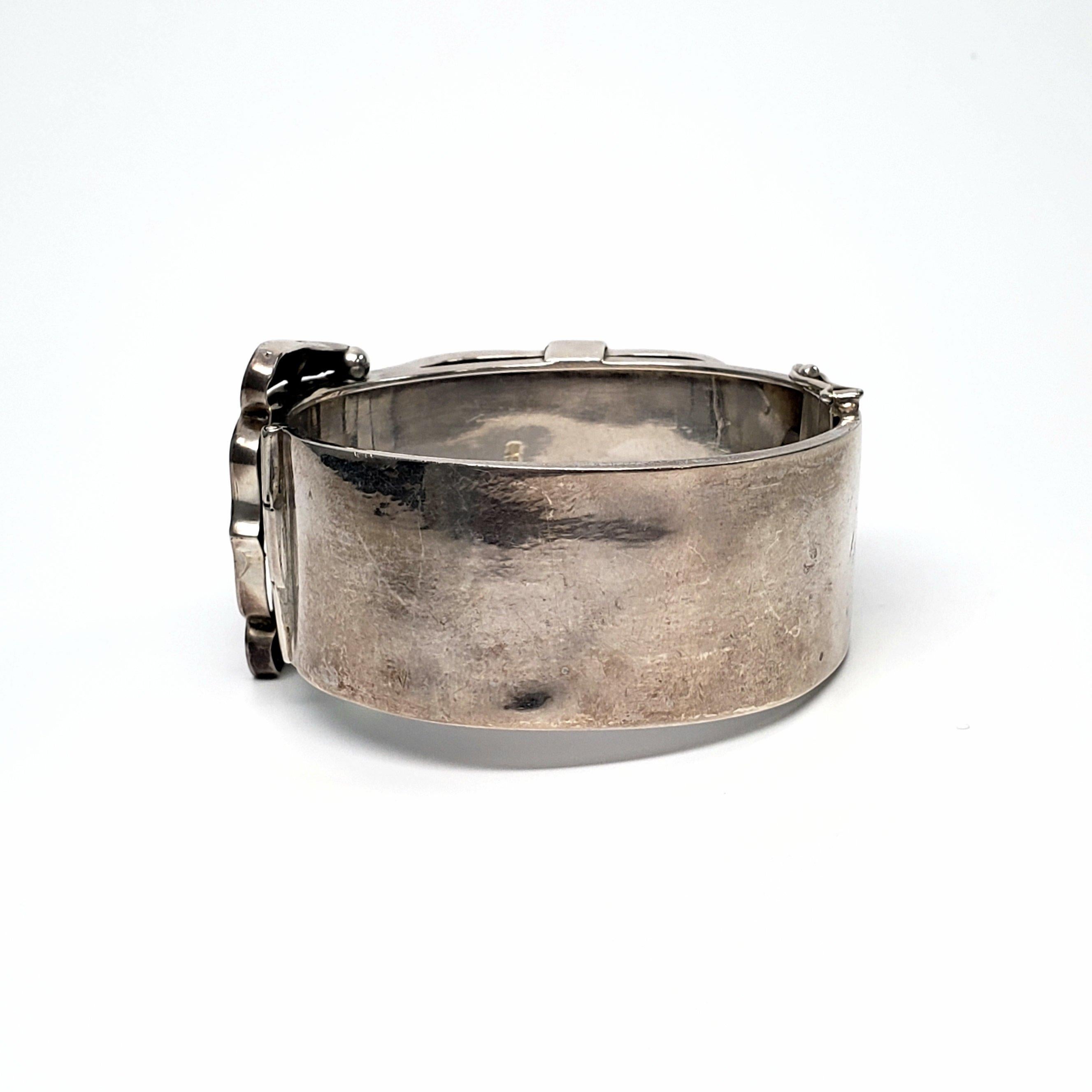Antique English sterling silver hand etched belt buckle bracelet. Beautiful Art Nouveau piece with floral hand etched design in front, smooth back. Circa 1908. Hidden clasp closure with safety lock. 
Measures 7