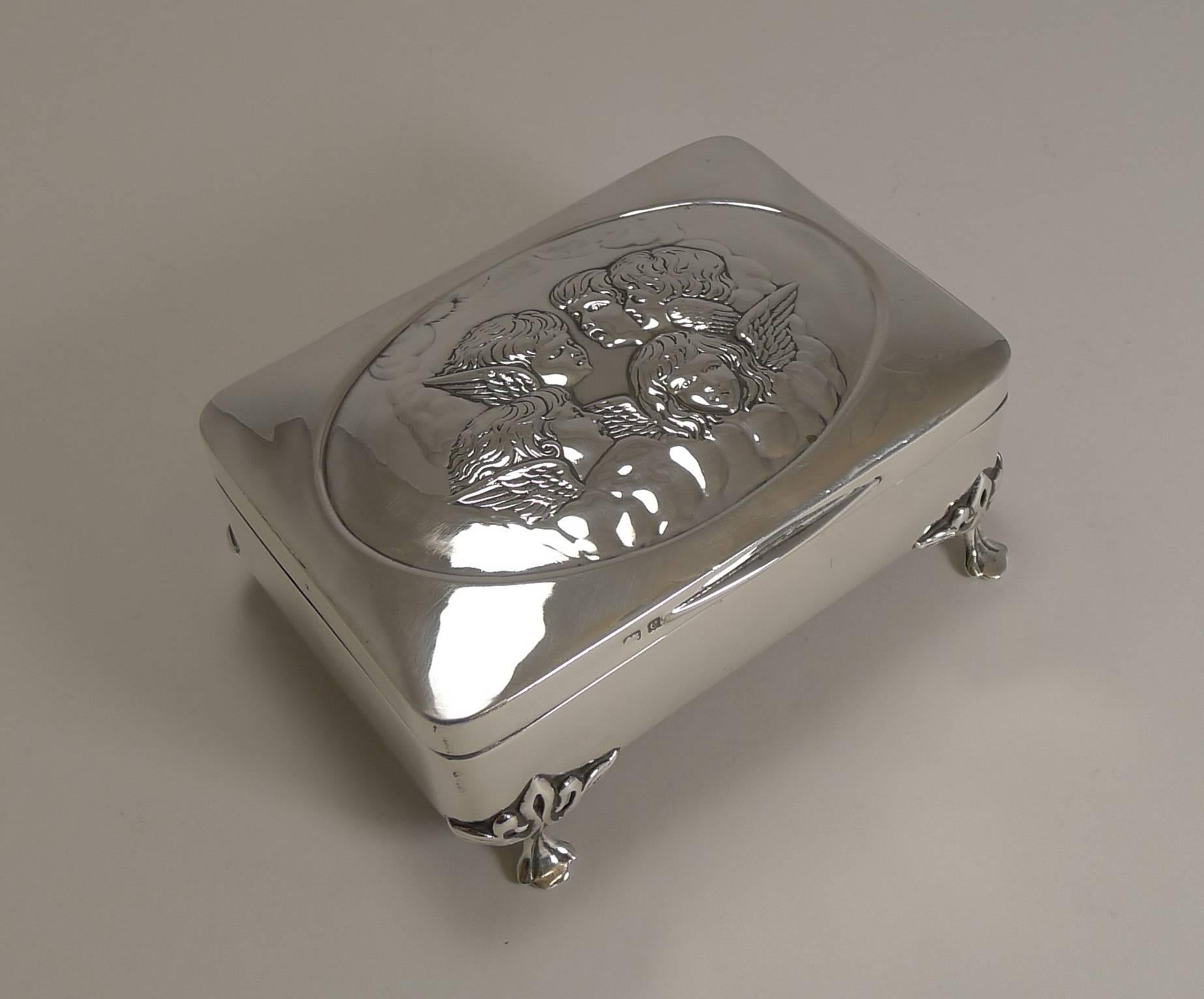A beautiful quality example, a good large size and lovely condition.

The box is made from English sterling silver with a full hallmark for Birmingham, 1904, Edwardian in era. The makers initials are also present for the silversmith, W H
