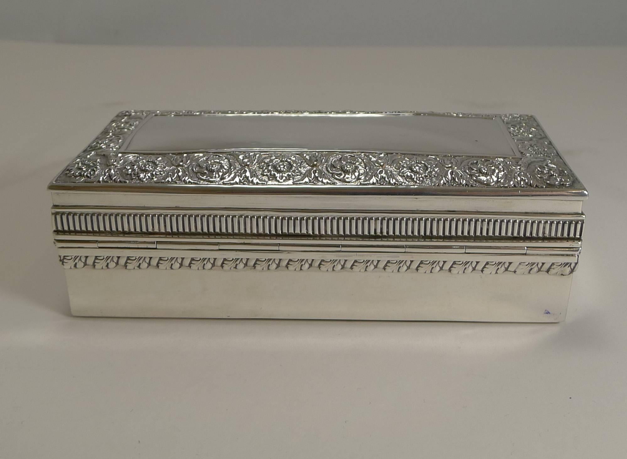 A stunning late Victorian jewellery box, made from English sterling silver fully hallmarked for London 1895, a true Victorian in era. The makers initials are also there for the famous silversmith, William Hutton and Sons.

The domed lid has a