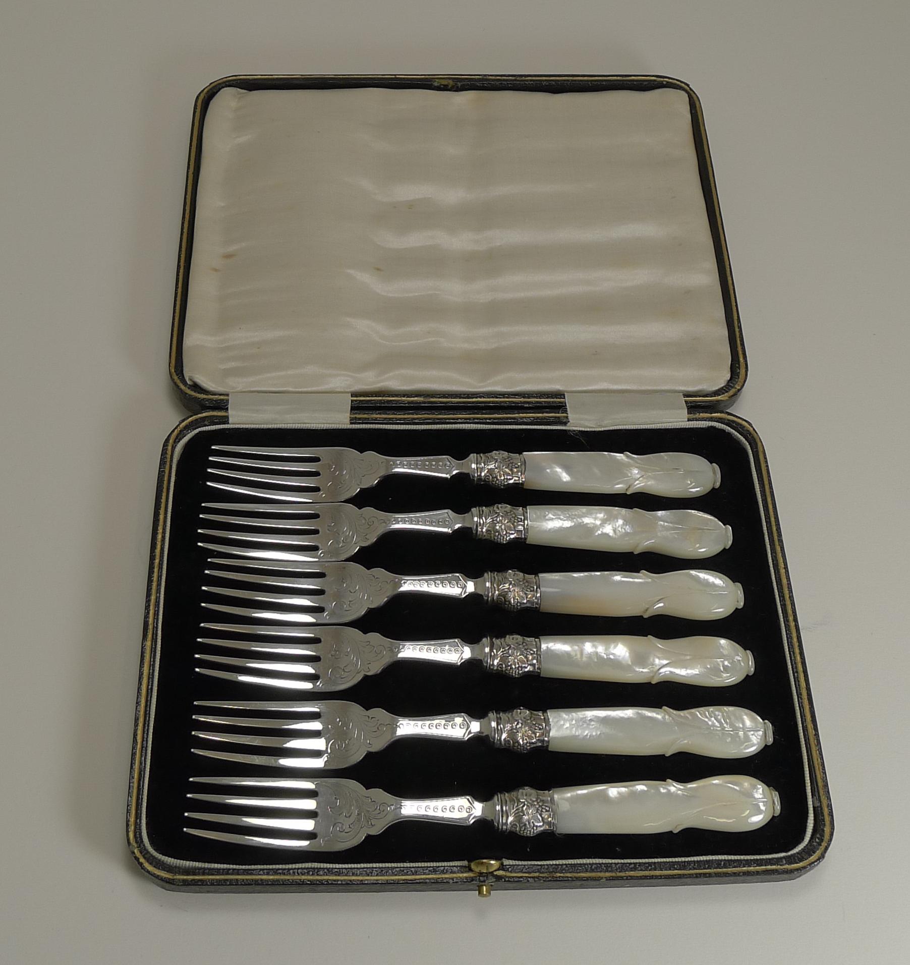 A wonderful set of six desert, fruit or cake forks sitting in a presentation box, these would make a wonderful gift.

The forks are made from sterling silver, made by the silversmith, Martin Hall and Co., each hallmarked for Sheffield 1873. This