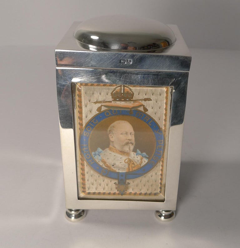 A wonderful and rare example of an English playing card box by the silversmith's, Grey & Co.

Standing on the original four feet, all four panels retain the original bevelled glass protecting four original antique playing cards; clearly this