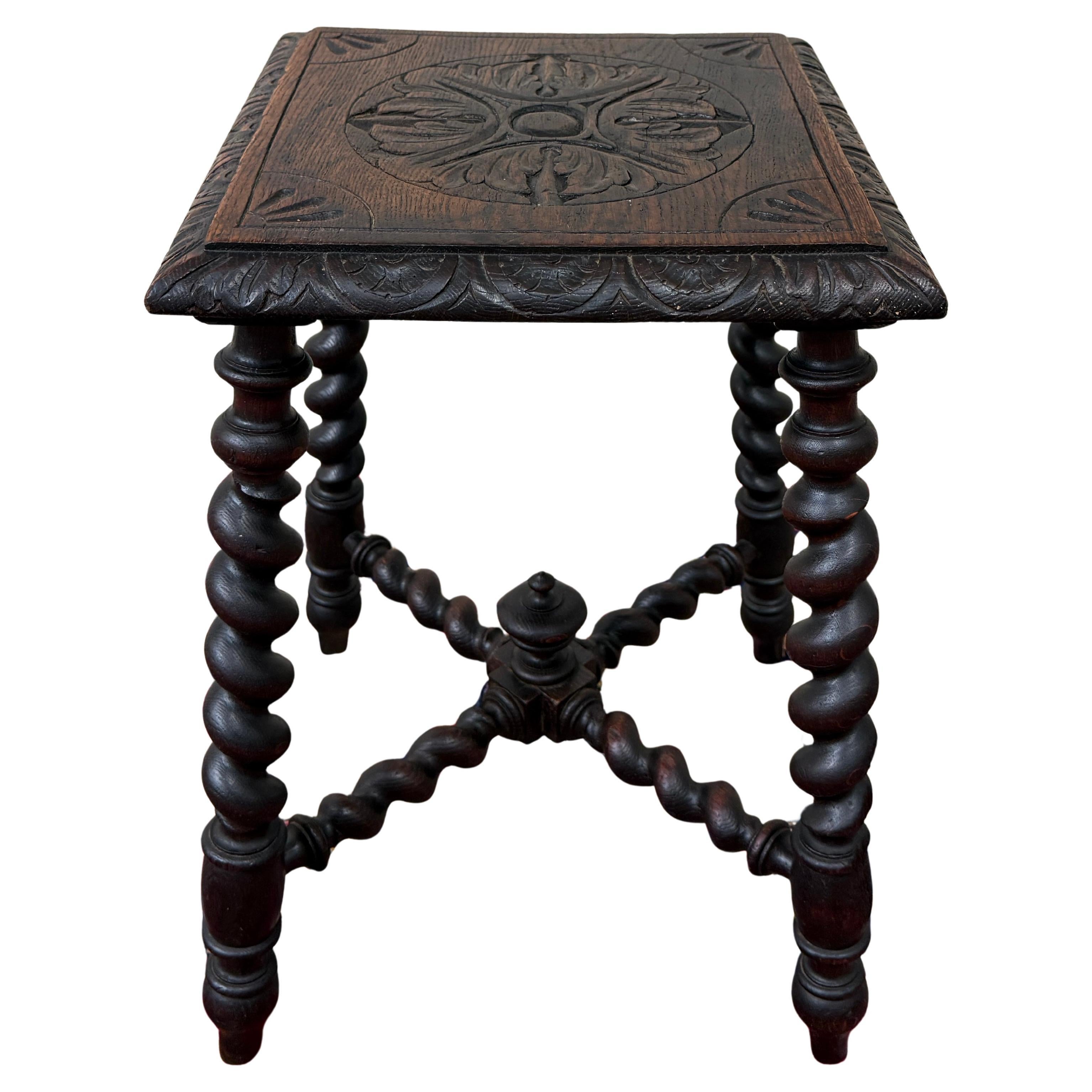 BEAUTIFUL Antique English Carved Oak Barley Twist Stool Footstool Bench with Carved Topc. 1920s

Barley twist legs and 