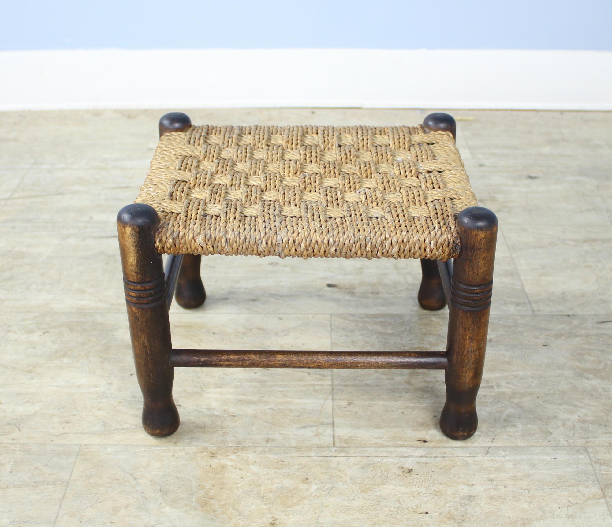 A sweet little string stool, perfect for the bedroom, living room or as a perch by the fireplace. Nice carved detail and interesting wear on the legs. A little gem!
