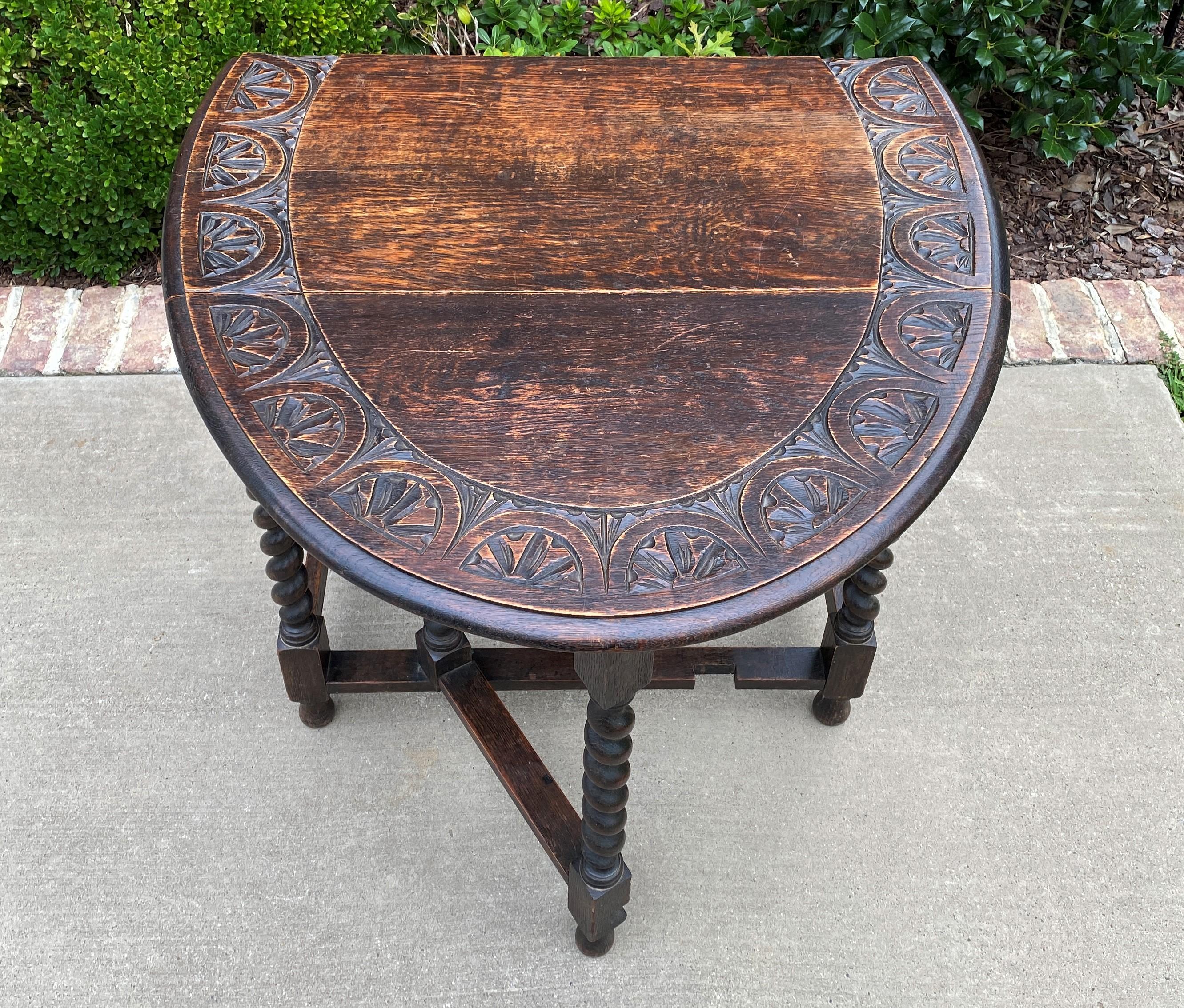 Jacobean Antique English Table Drop Leaf Gateleg Barley Twist Oval Carved Top Oak, 1920s