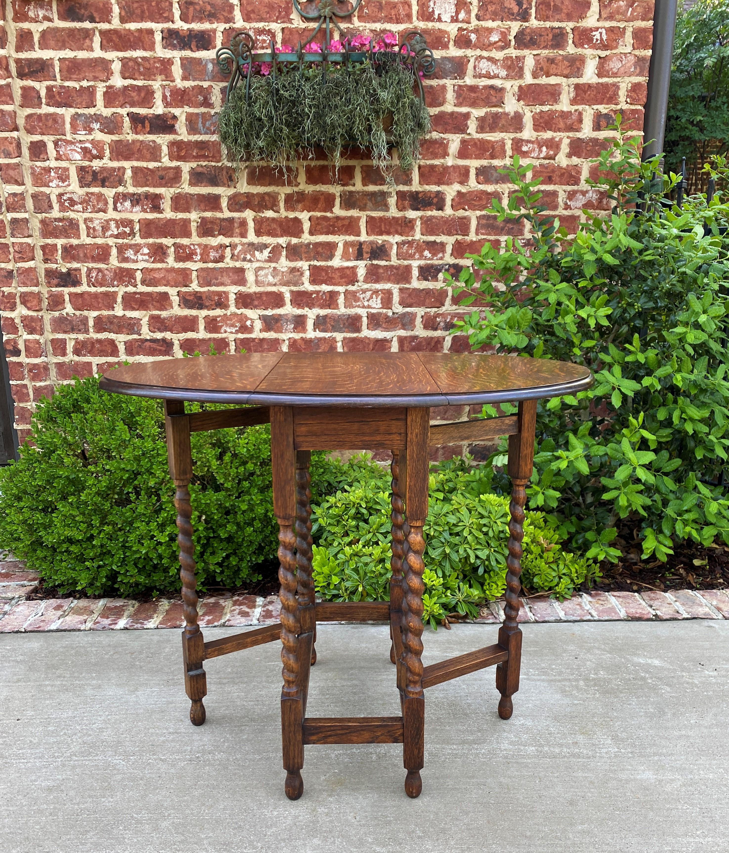 Antique English Table Drop Leaf Gateleg Barley Twist Oval Tiger Oak 1920s In Good Condition In Tyler, TX