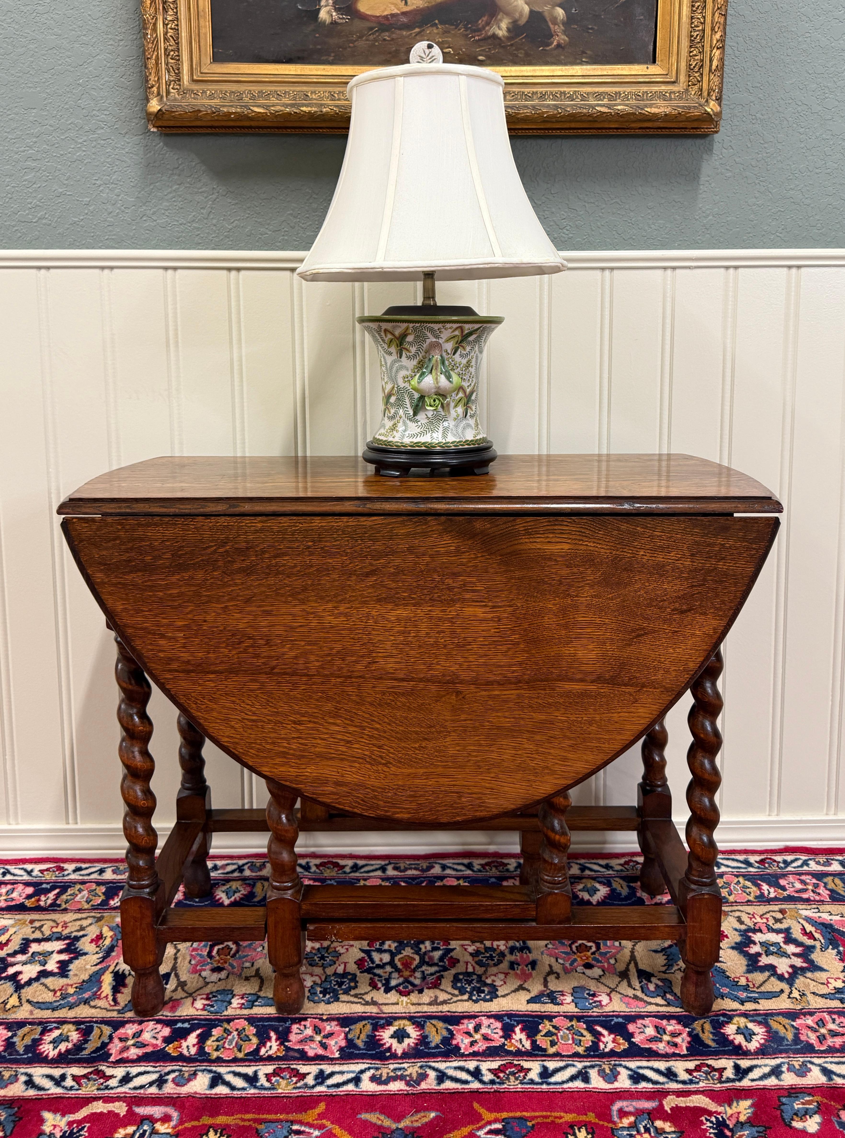 Carved Antique English Table Drop Leaf Gateleg Barley Twist Tiger Oak Oval c. 1920-30s For Sale