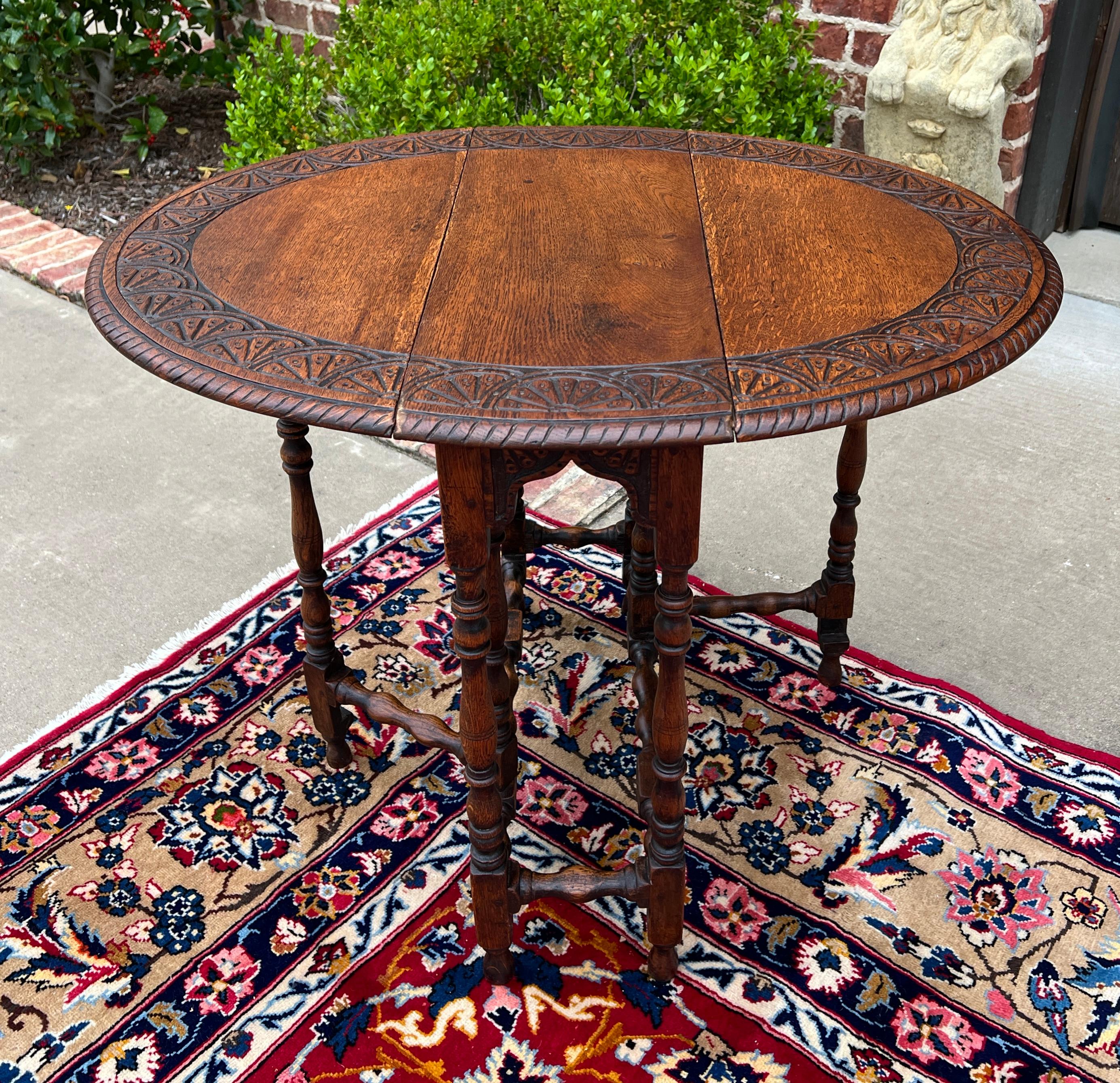 Antique English Table Drop Leaf Gateleg Turned Post Carved Top Oak Oval For Sale 8