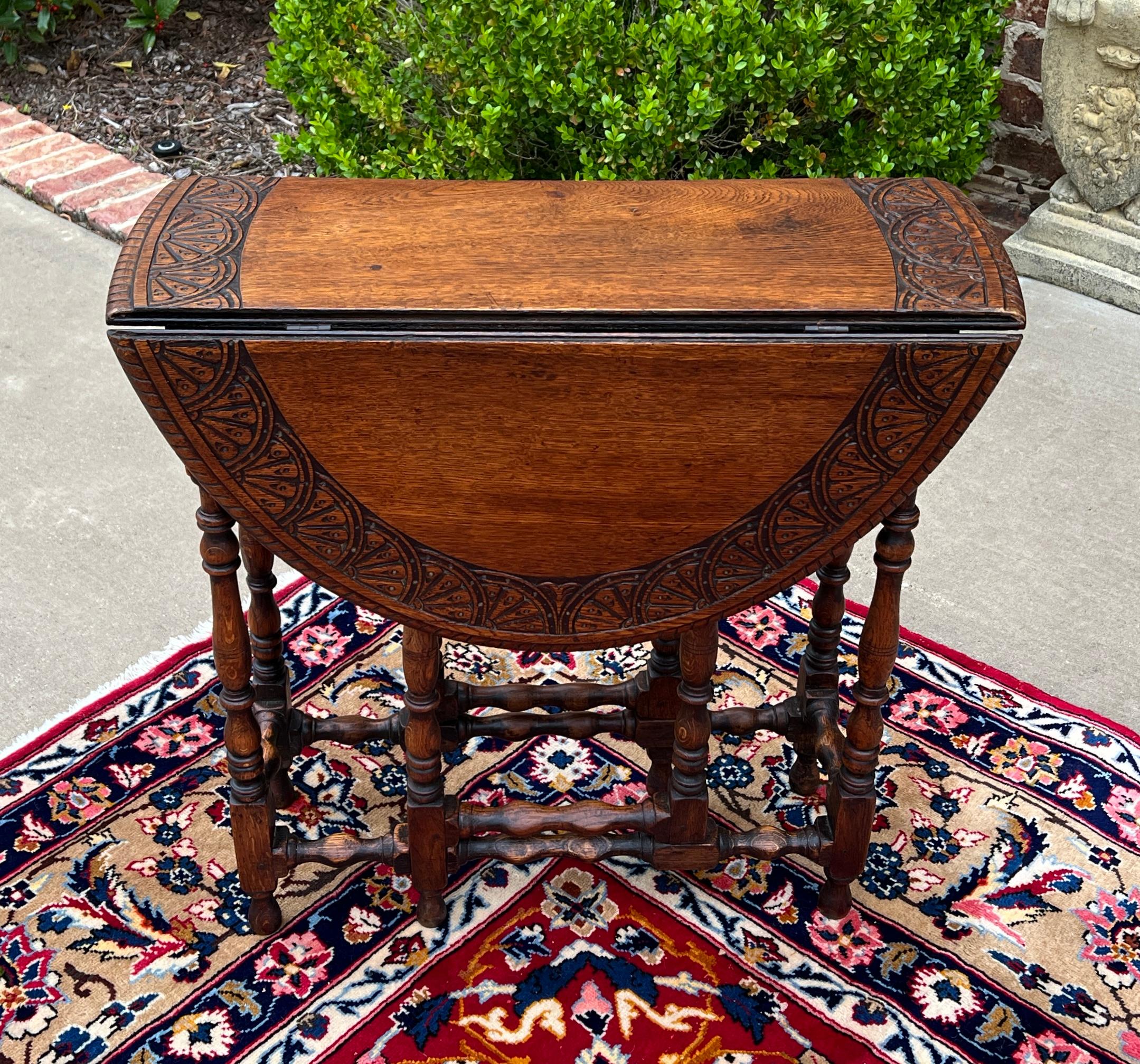 CHARMING Antique English Oak Drop Leaf  Gateleg Oval Table~~CARVED TOP~~Turned Post  Legs ~~c. 1920s  


        Always in high demand~~hard-to-find drop leaf table with turned post legs

        Solid and sturdy with very nice oak patina 

       