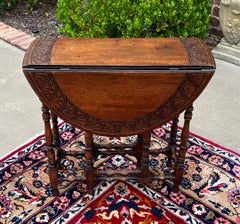 Antique English Table Drop Leaf Gateleg Turned Post Carved Top Oak Oval