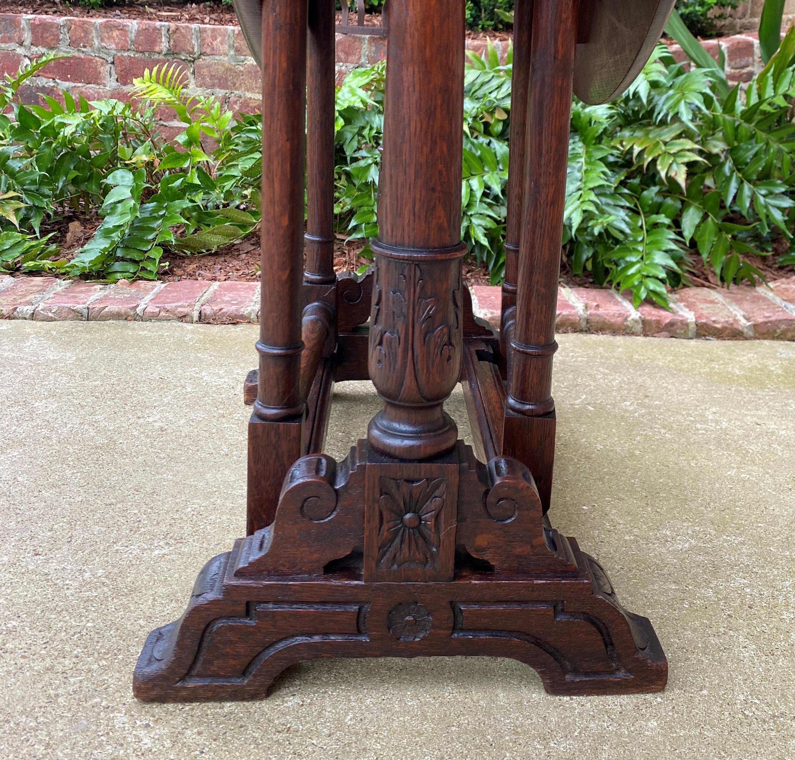 Antique English Table Drop Leaf Gateleg Turned Post Carved Top Trestle Base Oak For Sale 5