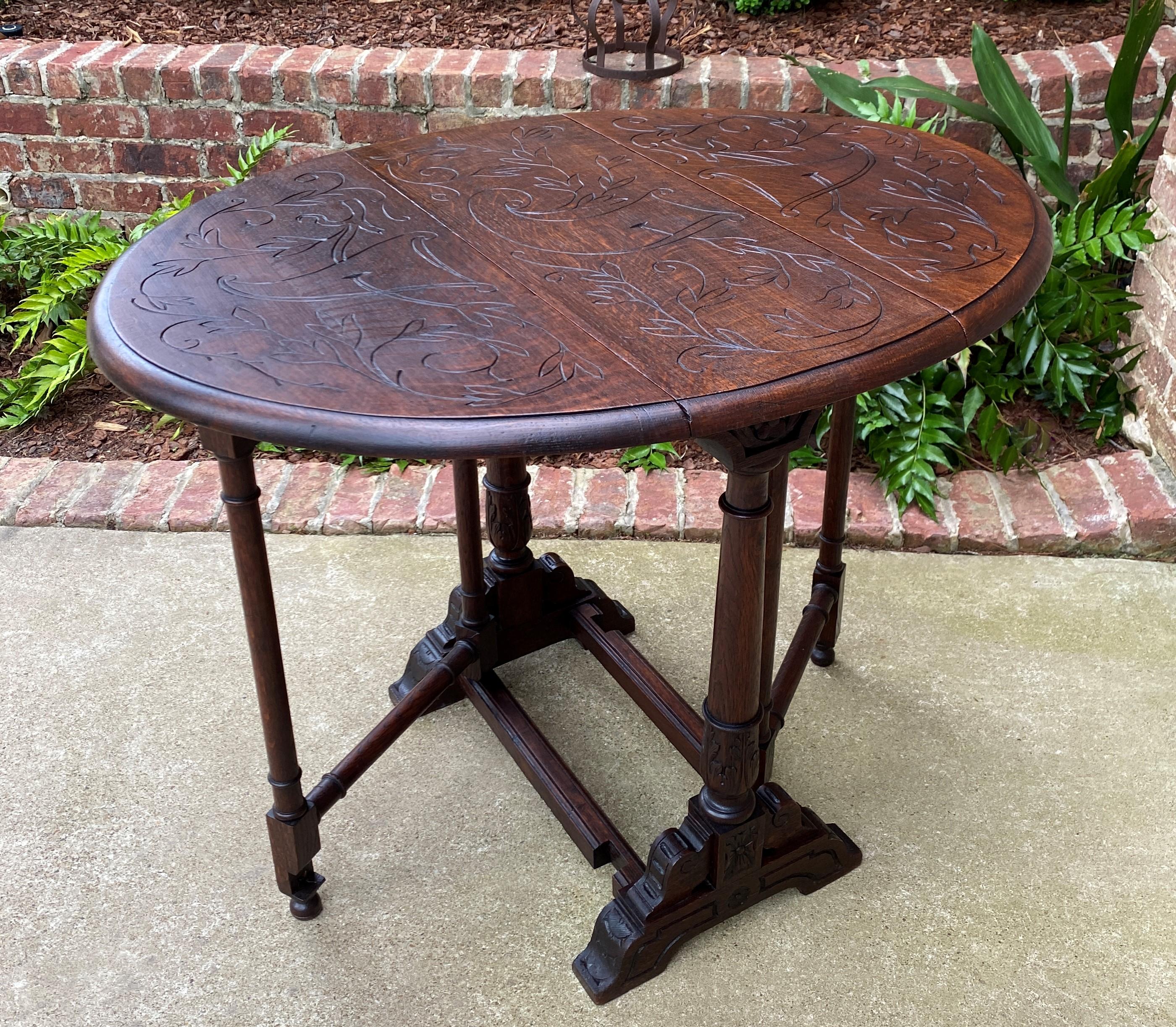 Antique English Table Drop Leaf Gateleg Turned Post Carved Top Trestle Base Oak For Sale 6