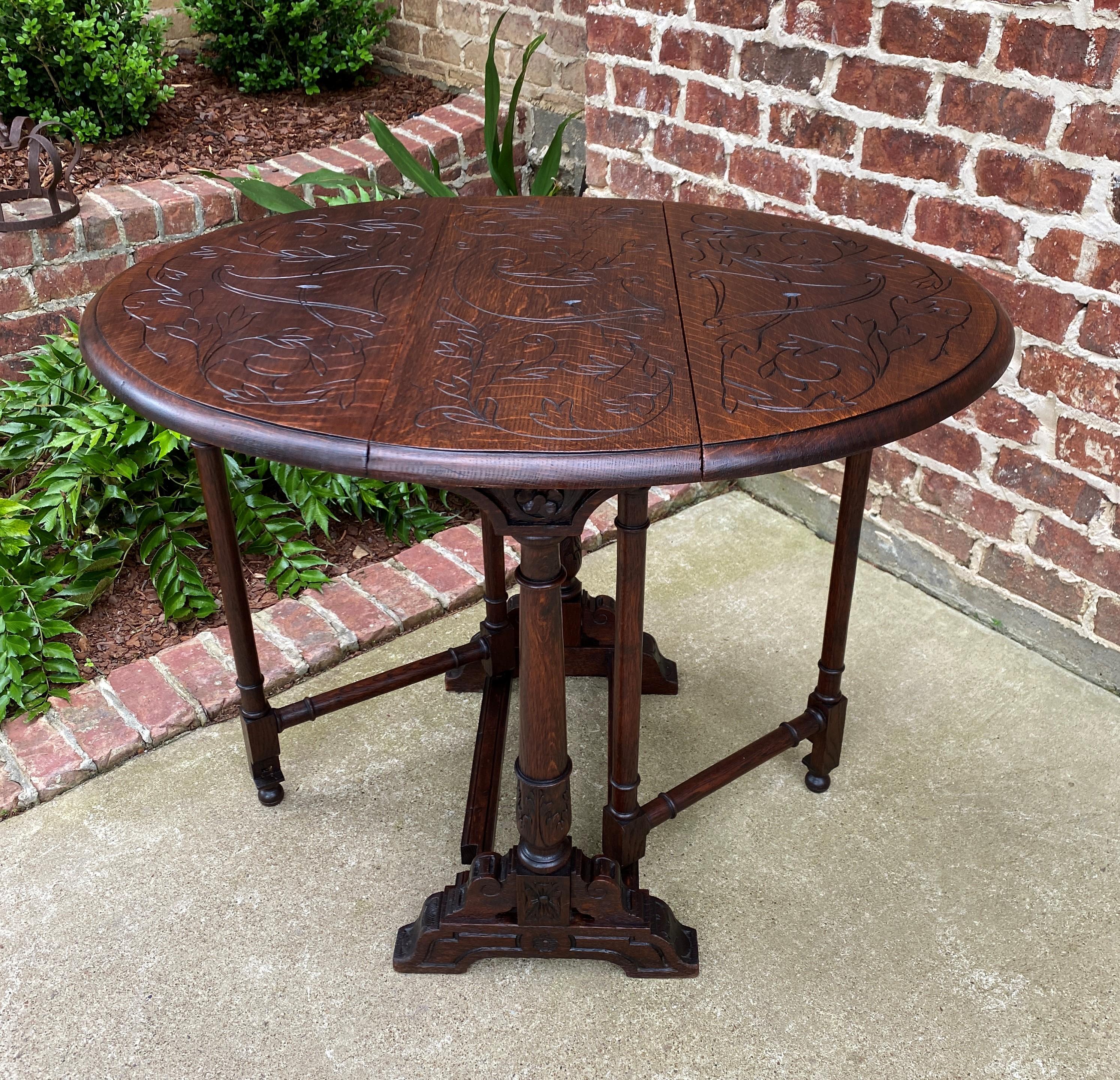 Antique English Table Drop Leaf Gateleg Turned Post Carved Top Trestle Base Oak For Sale 8