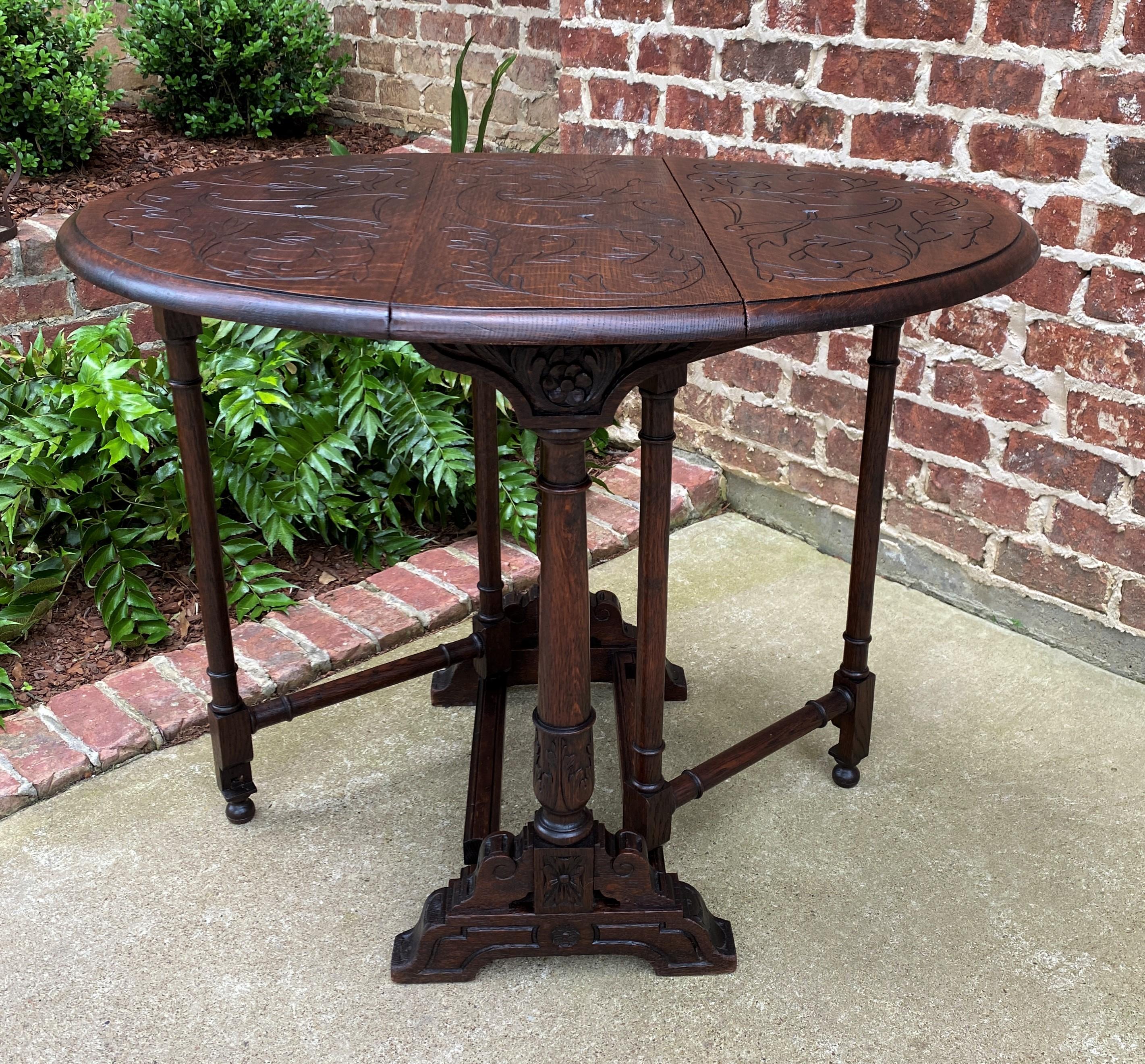 Antique English Table Drop Leaf Gateleg Turned Post Carved Top Trestle Base Oak For Sale 9