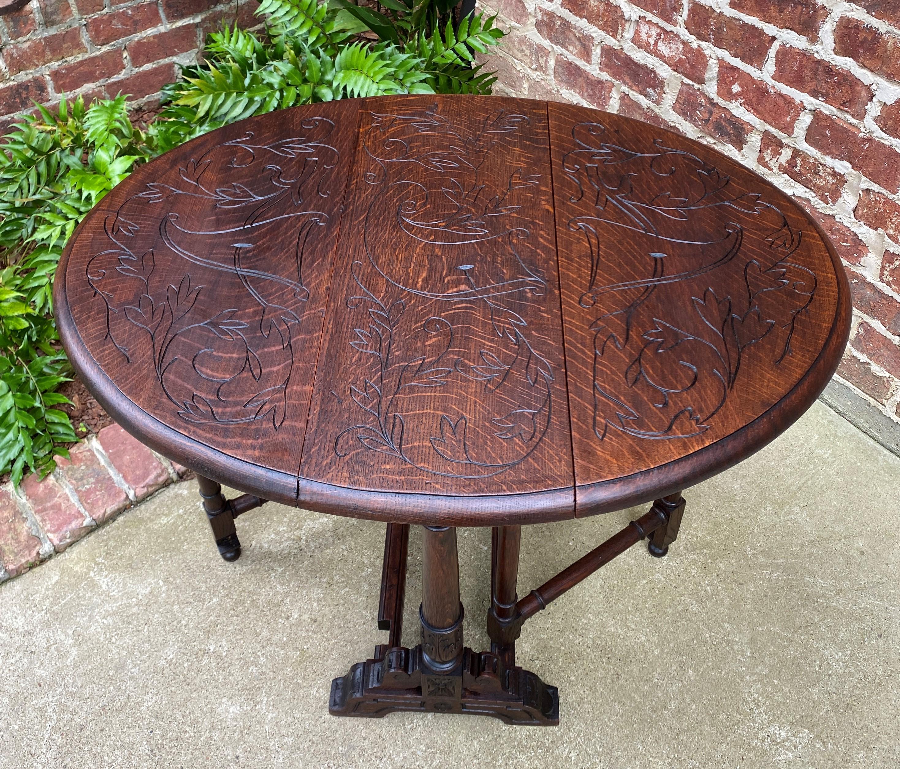 Antique English Table Drop Leaf Gateleg Turned Post Carved Top Trestle Base Oak For Sale 10