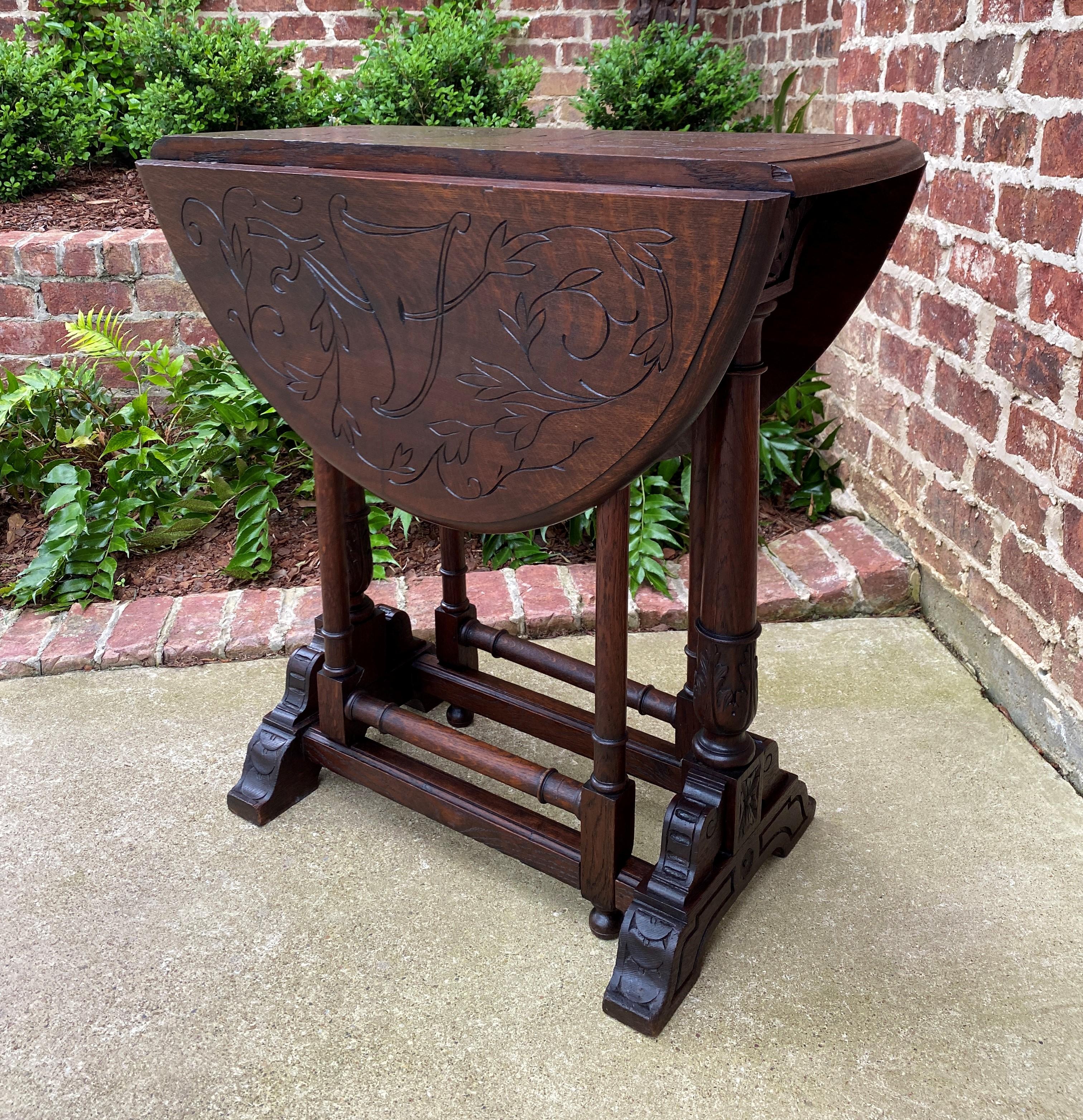 CHARMING Antique English Oak Drop Leaf Gateleg Oval Table~~CARVED TOP~~Turned Post Acanthus Legs with Carved Trestle Base~~c. 1920s 


 Always in high demand~~hard-to-find drop leaf table with turned post legs

 Solid and sturdy with very nice