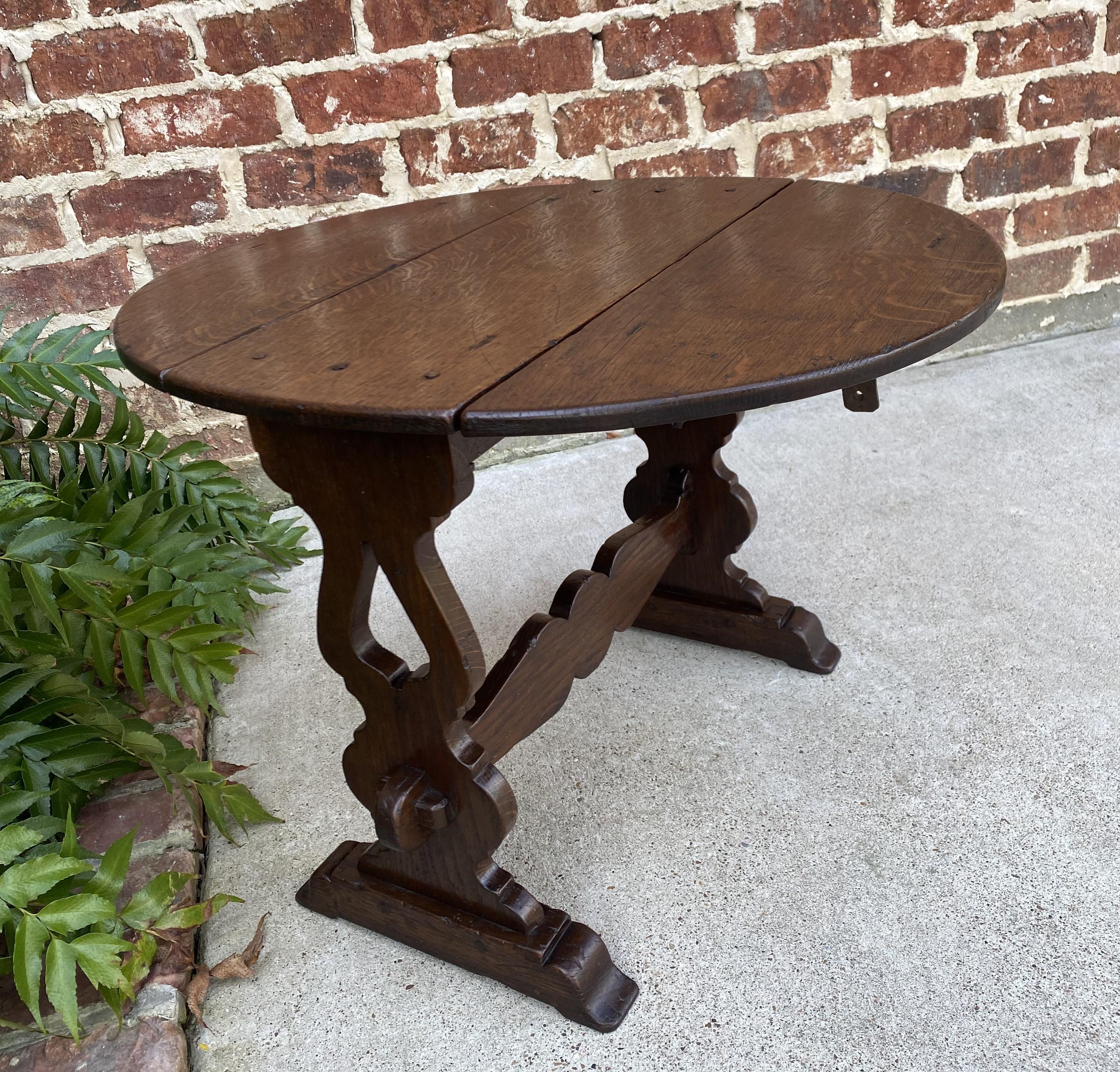 Antique English Table Drop Leaf Trestle Base Petite Oak Pegged Oval End Table In Good Condition In Tyler, TX