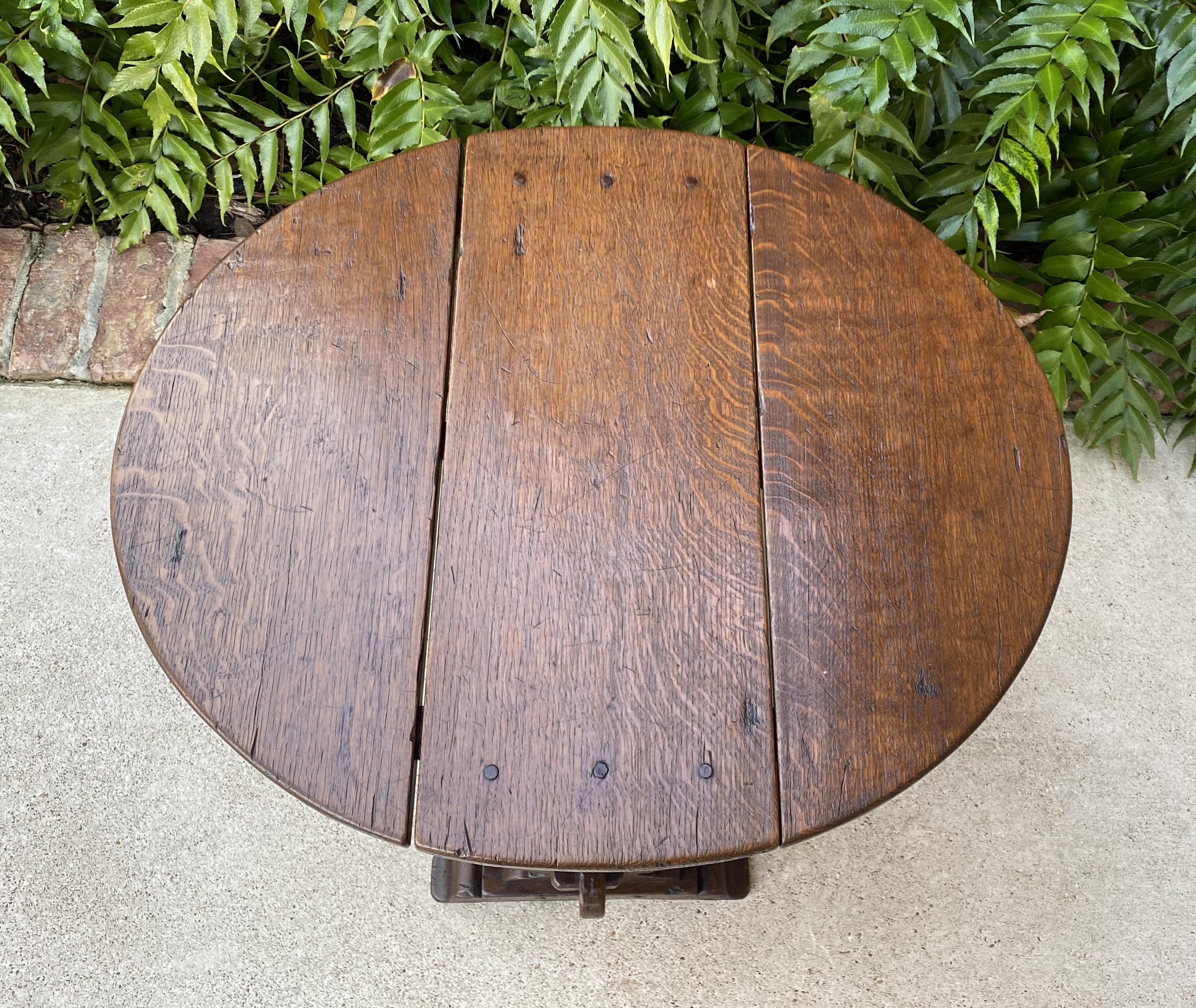 Early 20th Century Antique English Table Drop Leaf Trestle Base Petite Oak Pegged Oval End Table