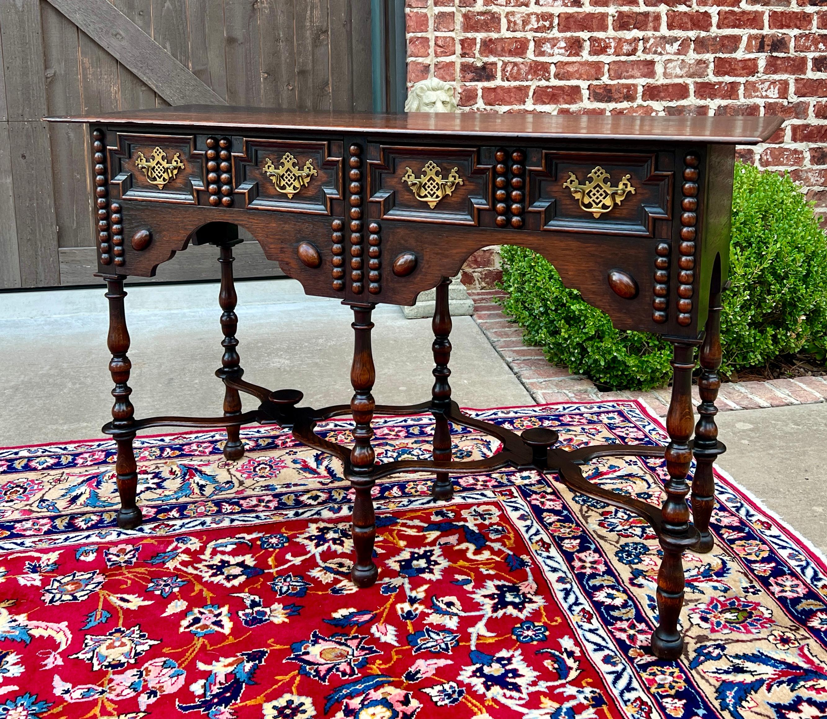 CHARMING Antique English William & Mary Oak Entry Table, Hall Table, Sofa Table or Console Table with Drawers~~c. 1900-1910

Excellent oak table with two drawers and bead and button accents~~original batwing hardware~~perfect for use as a hall or