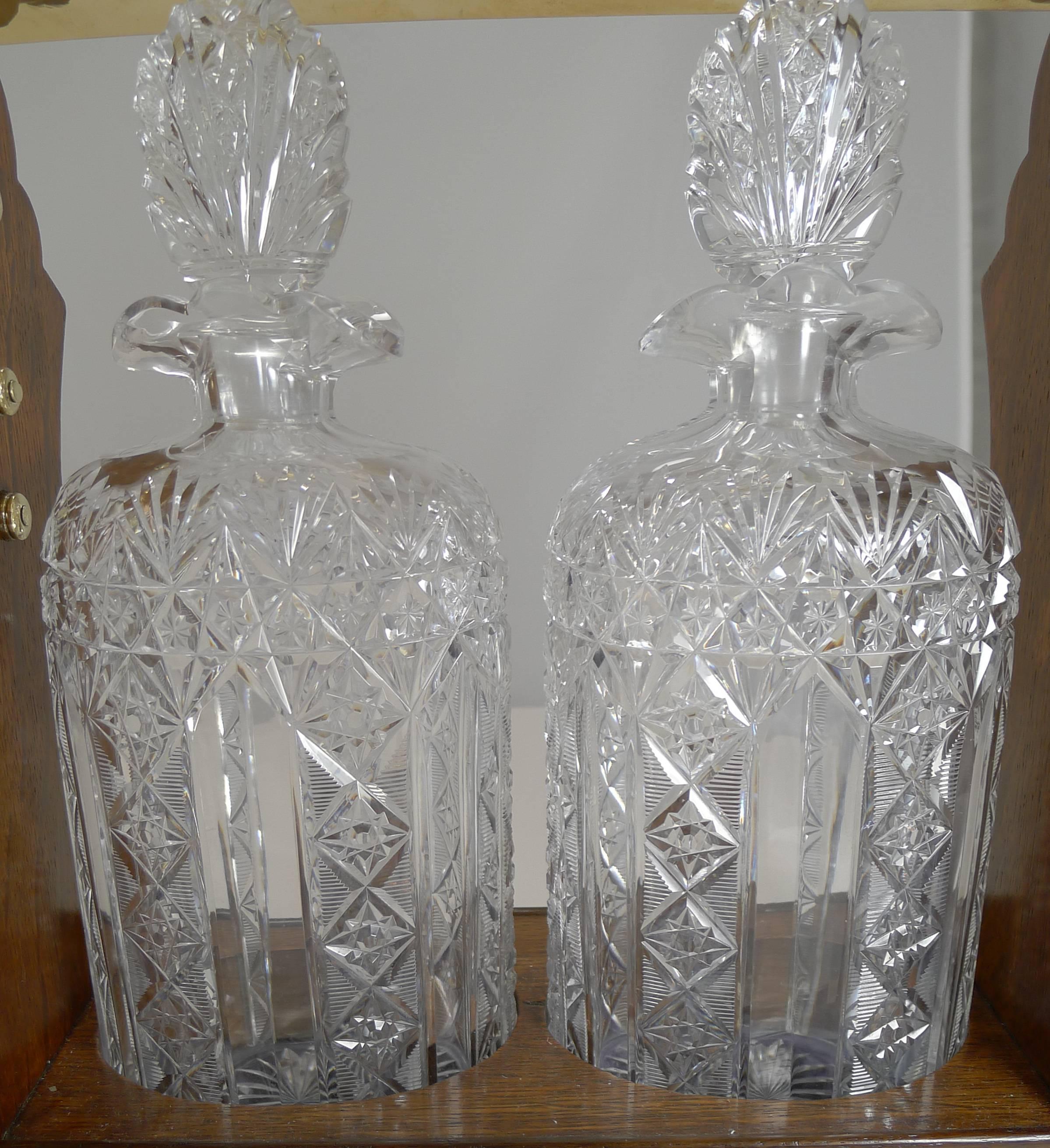 Late Victorian Antique English Tantalus Exceptional Cut Crystal Oval Decanters, circa 1890