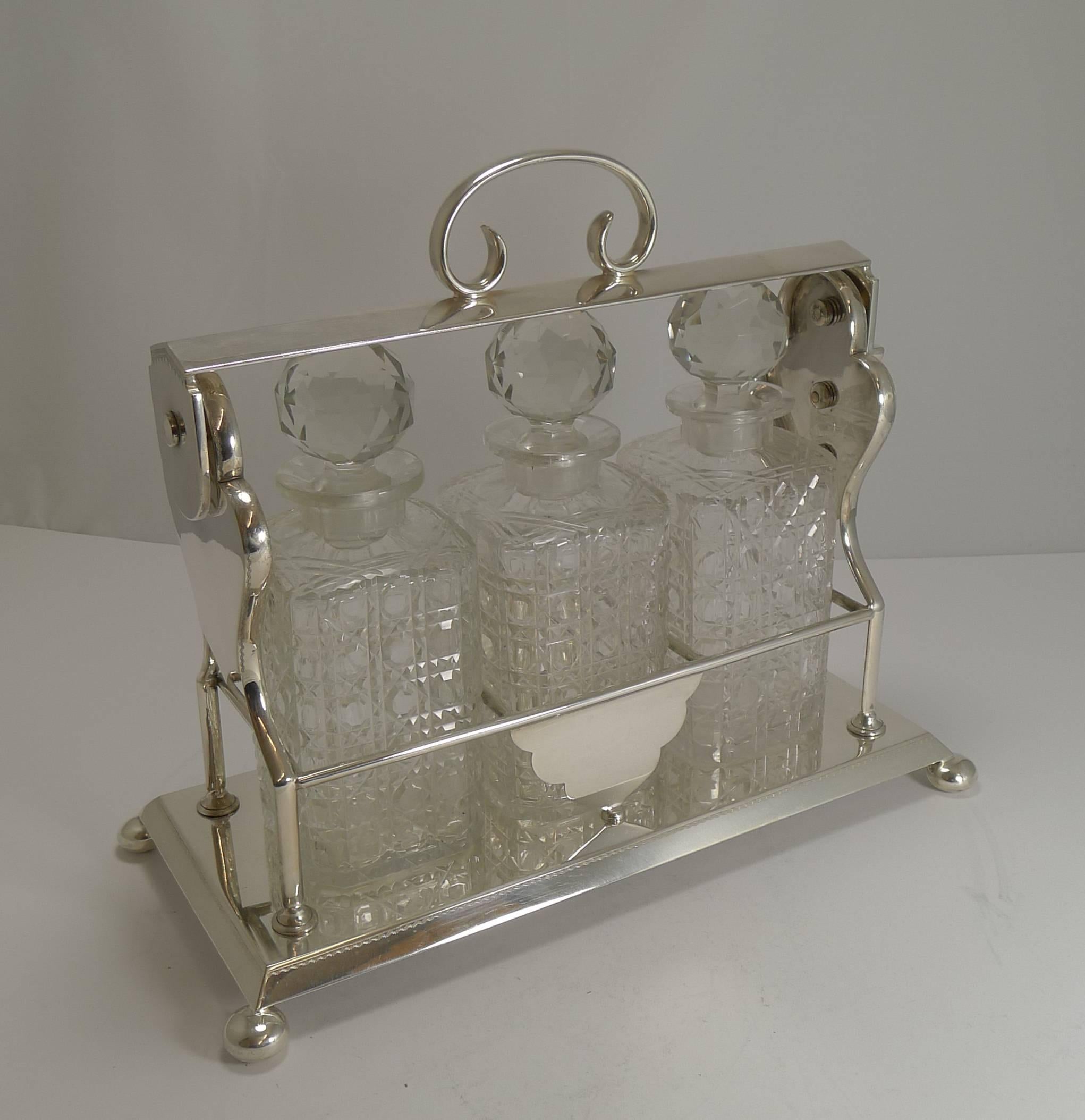 Antique English Three Bottle Tantalus by John Bishop Chatterley, circa 1910 In Excellent Condition In Bath, GB